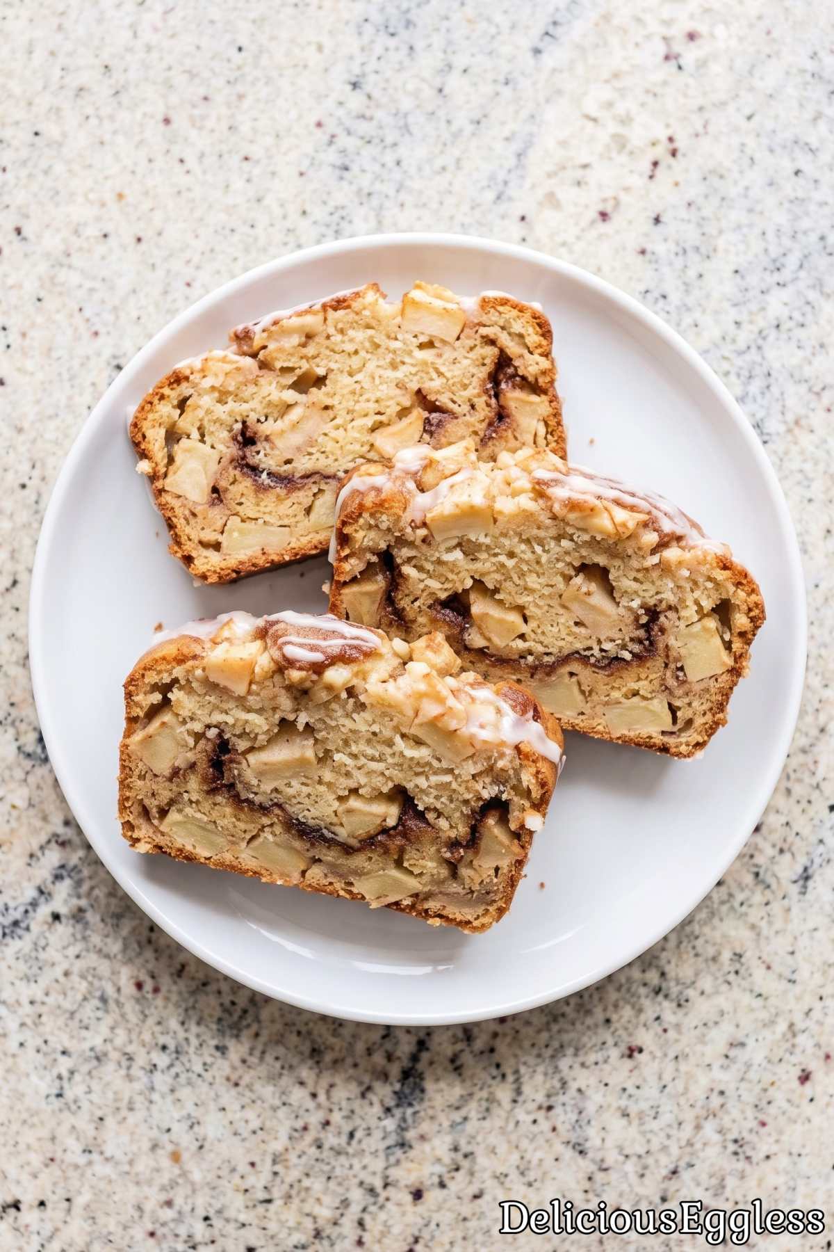 Glazed eggless apple fritter loaf slice