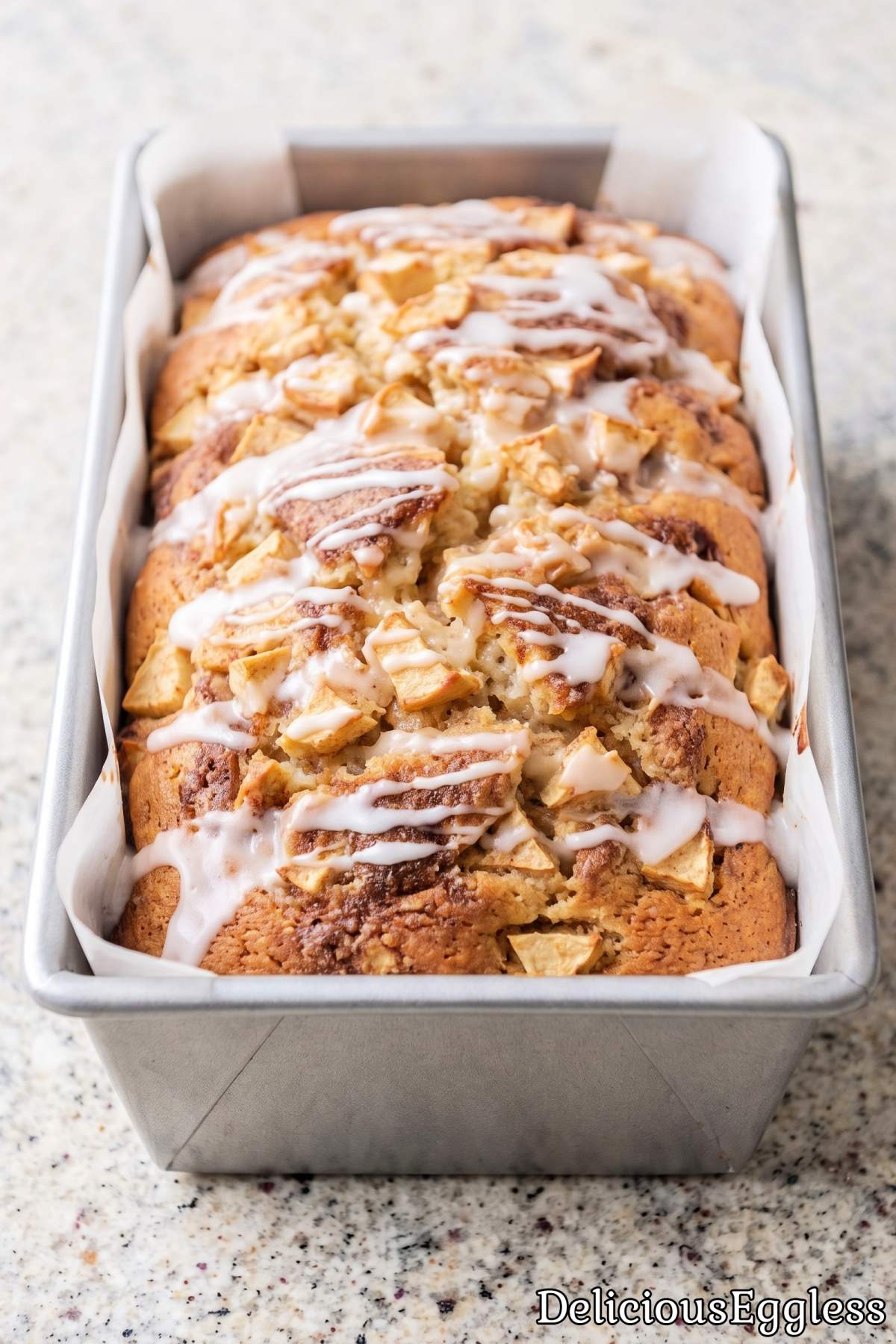 Thick slice of eggless apple fritter bread