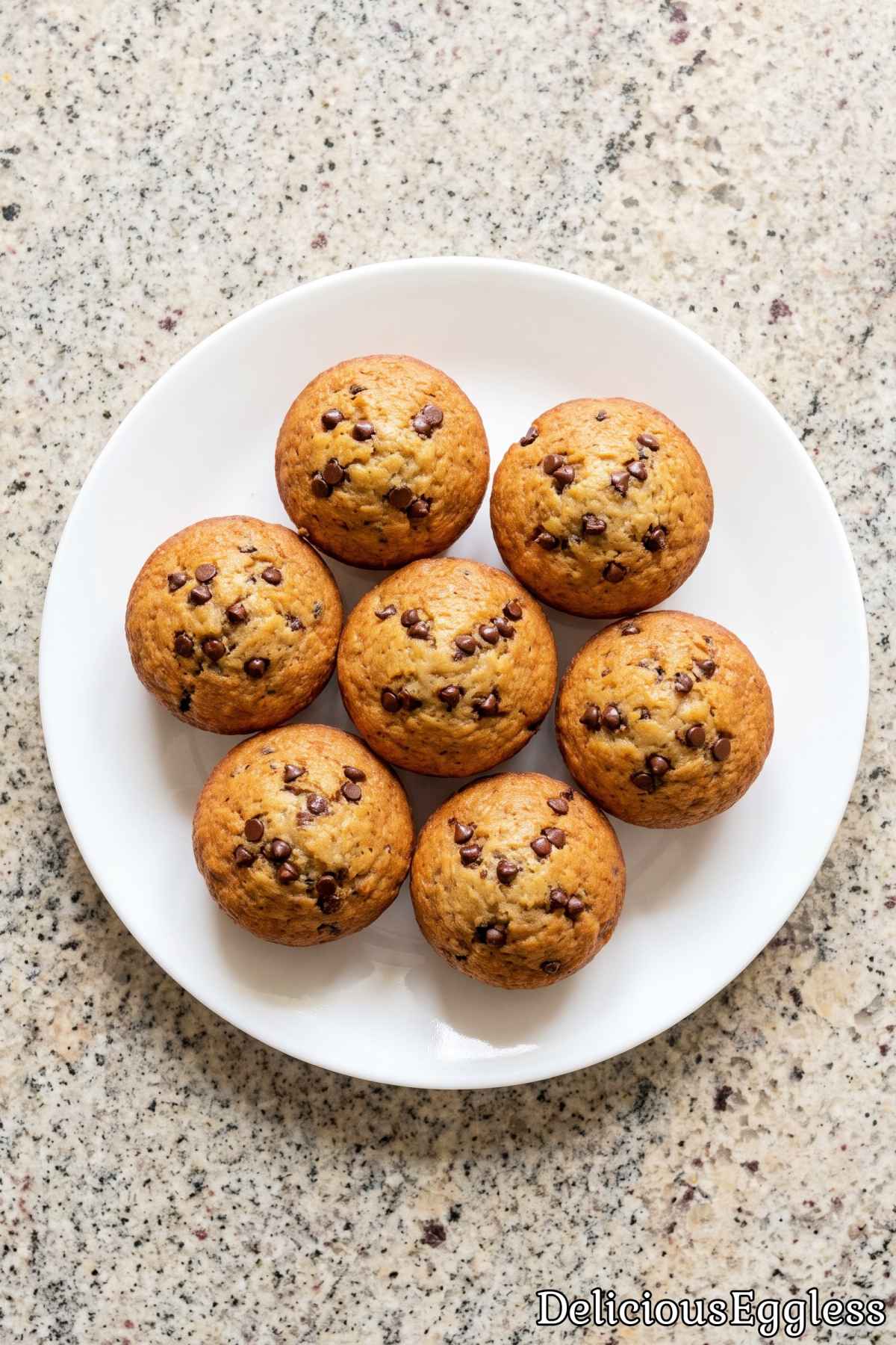 Warm eggless banana muffins on a plate