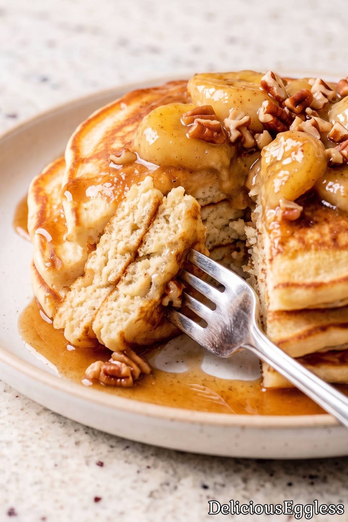 Fluffy eggless bananas foster pancakes