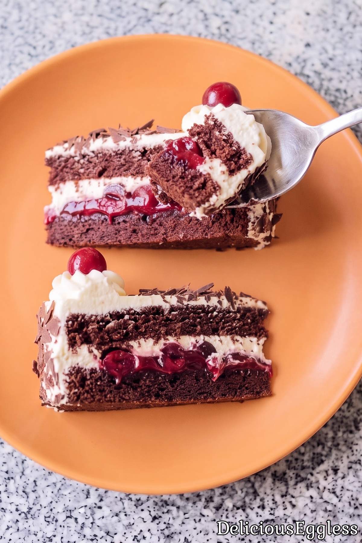 Decadent eggless black forest cake slice.