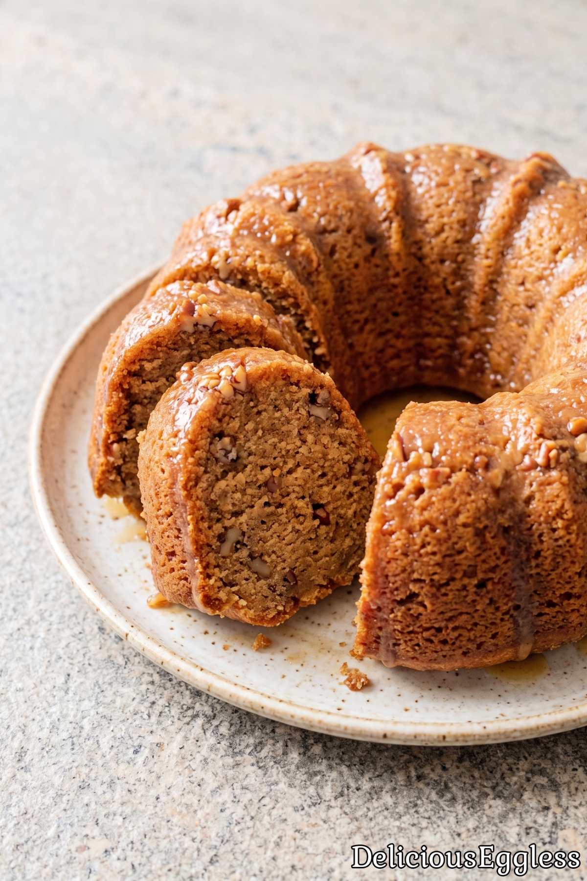 Warm slice of eggless butter rum cake