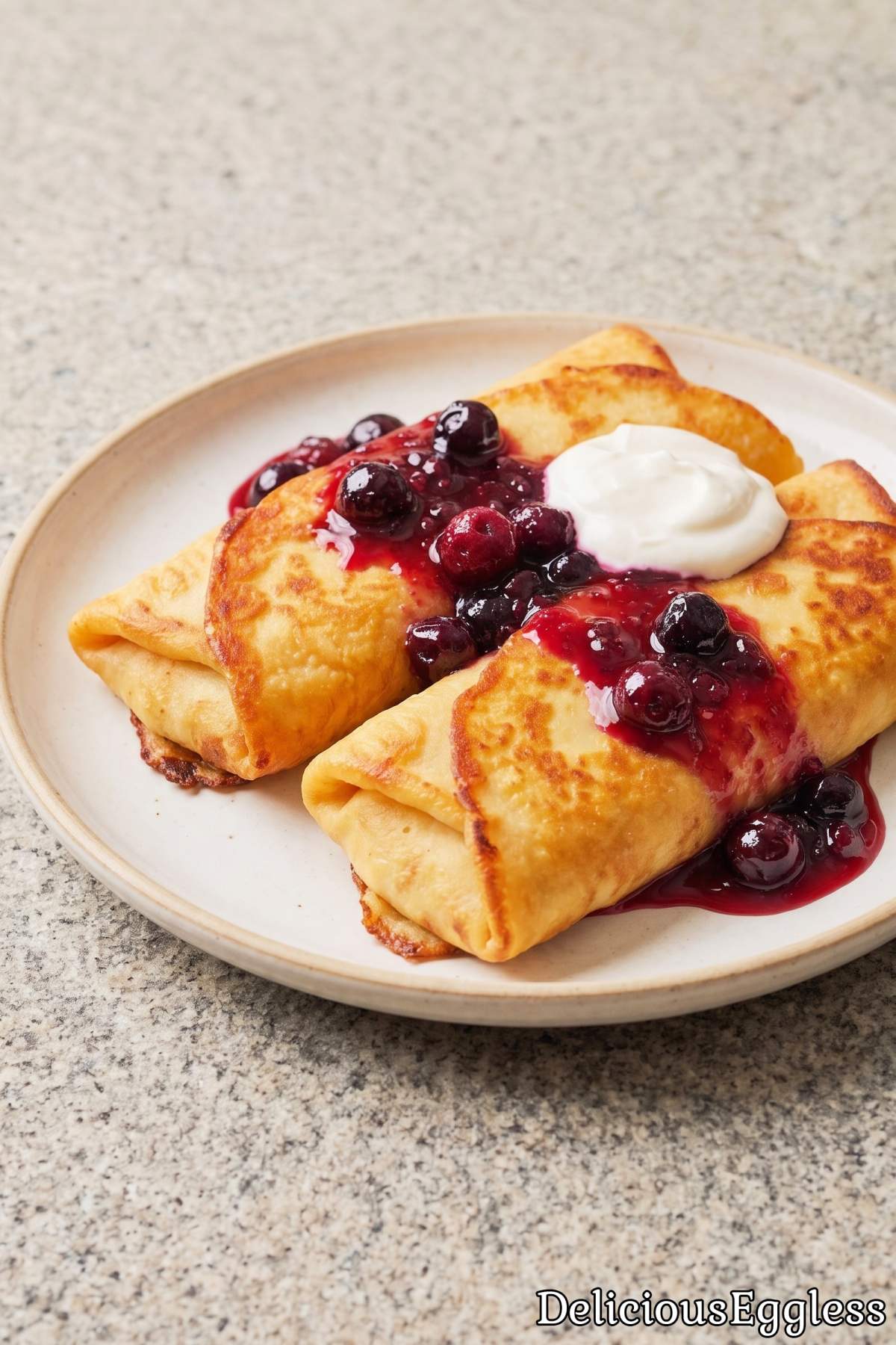 Tender eggless cheese blintzes on a plate