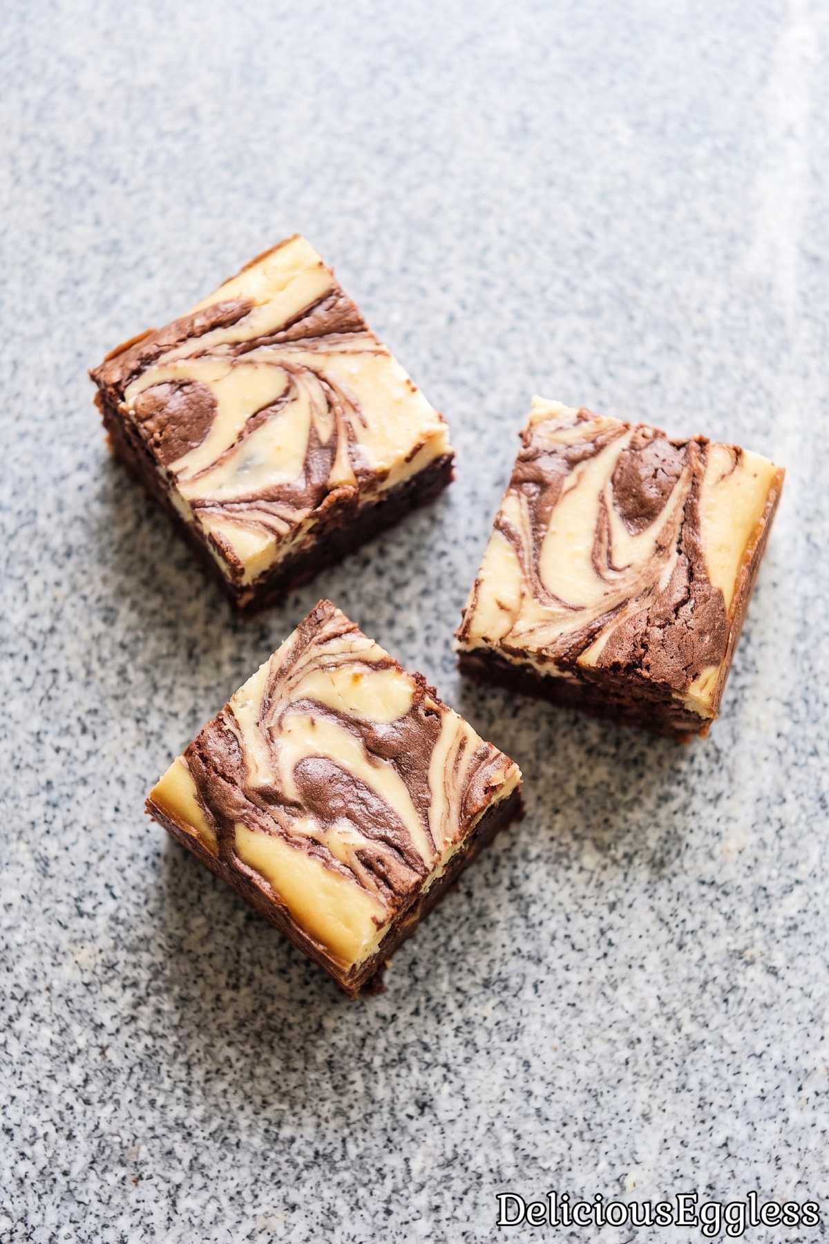 Sliced eggless cheesecake brownies