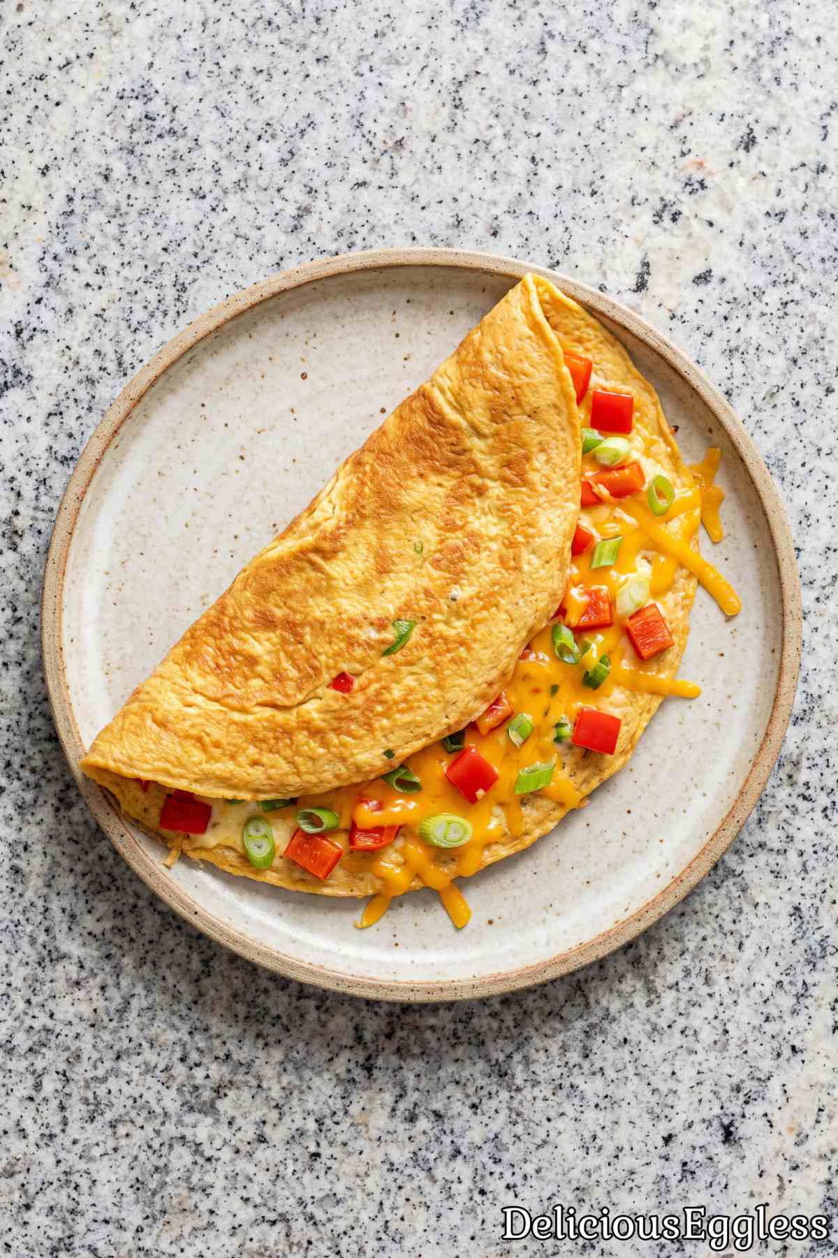 Eggless cheese omelet with chopped herbs