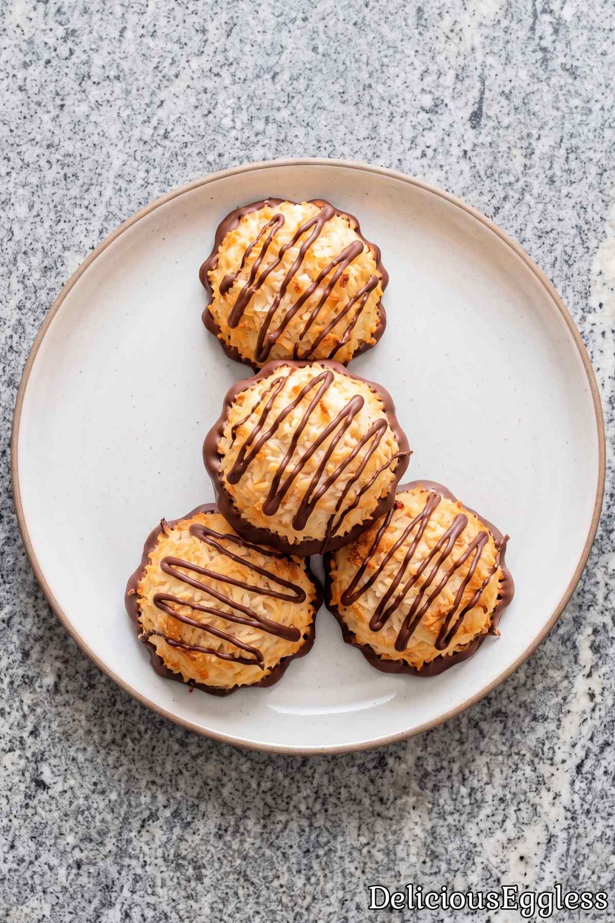Stack of golden chewy coconut macaroons.