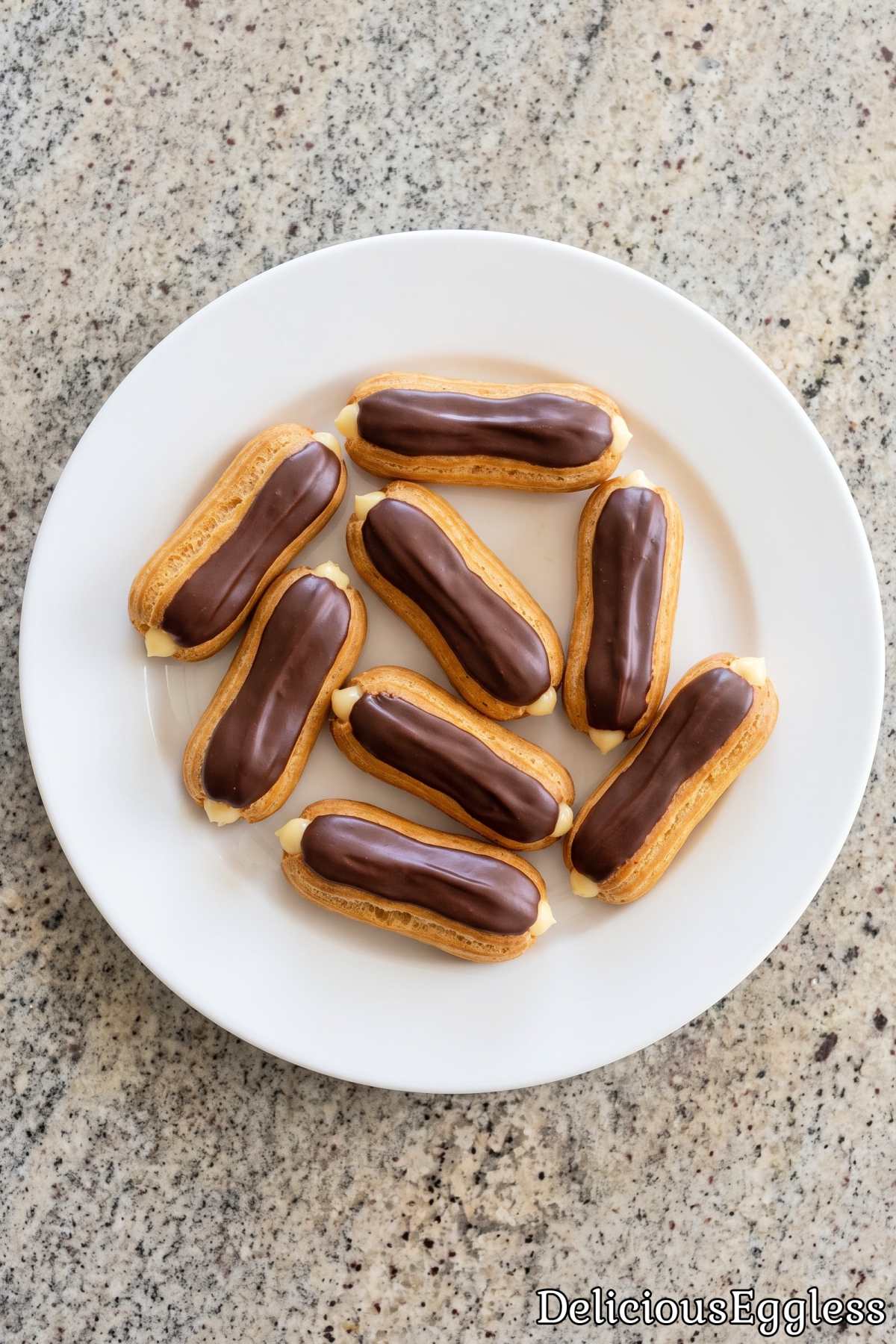 Rich chocolate glazed eggless eclairs