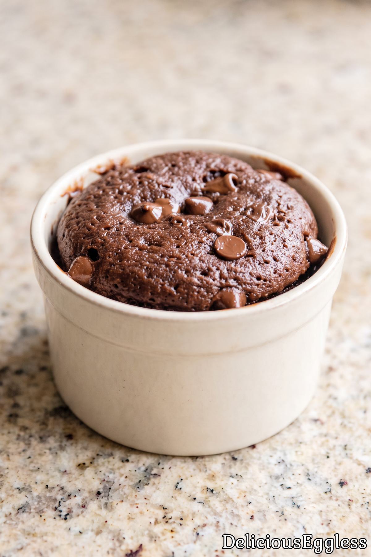 Homemade eggless chocolate cake in a mug