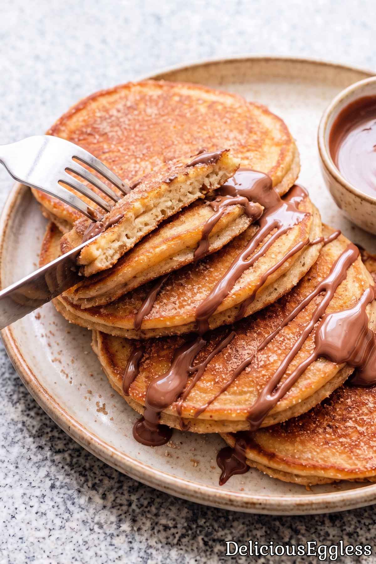 Warm homemade churro pancakes without eggs