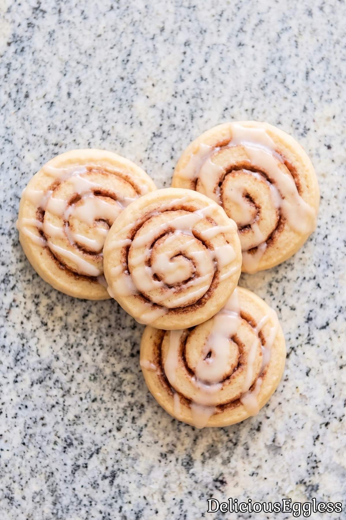 Eggless cinnamon roll cookies with sweet icing