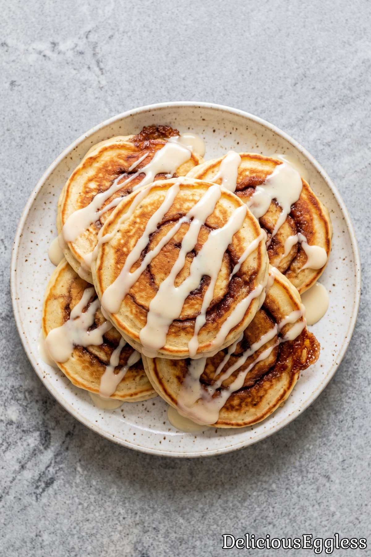 Fluffy eggless cinnamon roll pancakes