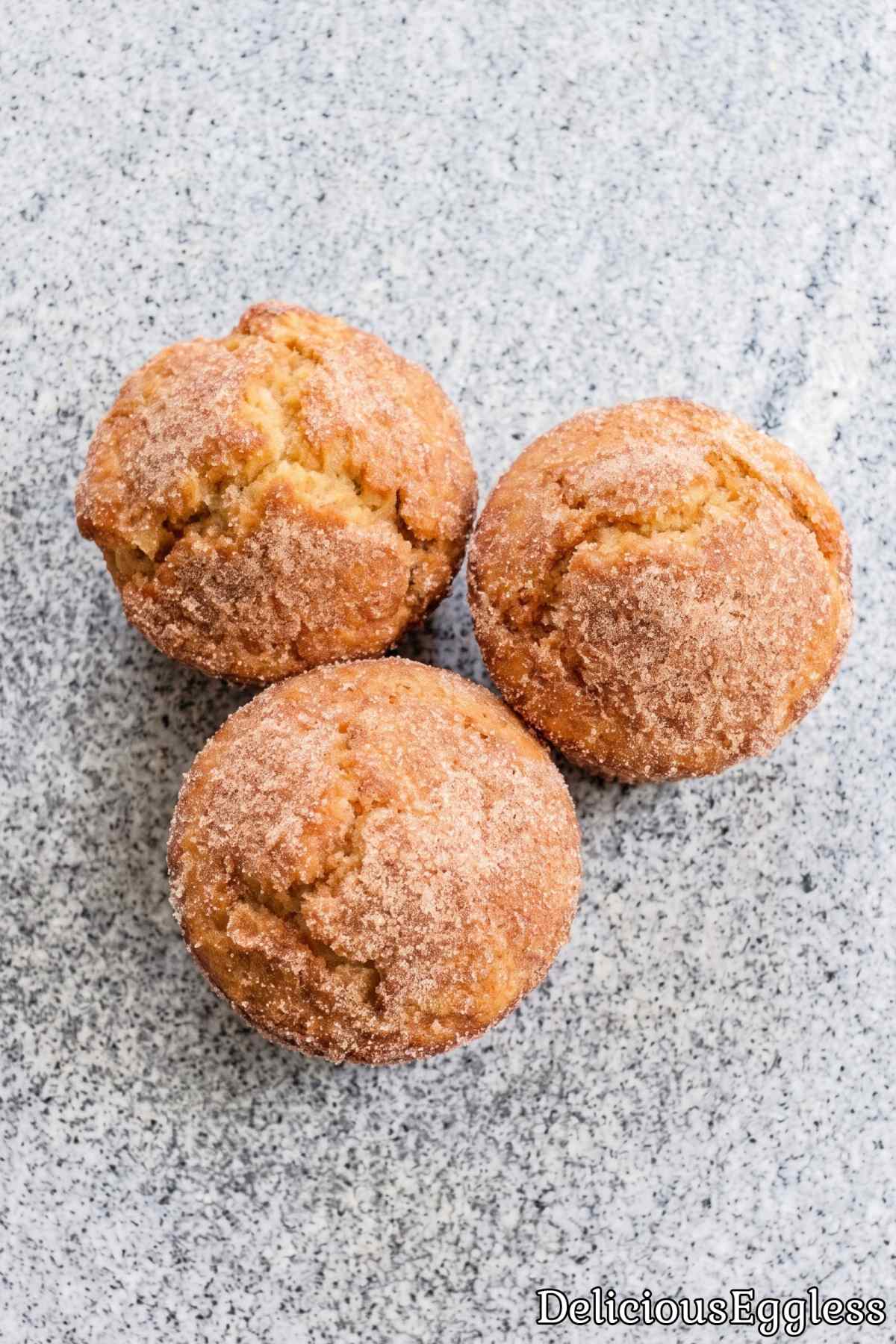 Spiced eggless donut muffins coated in sugar