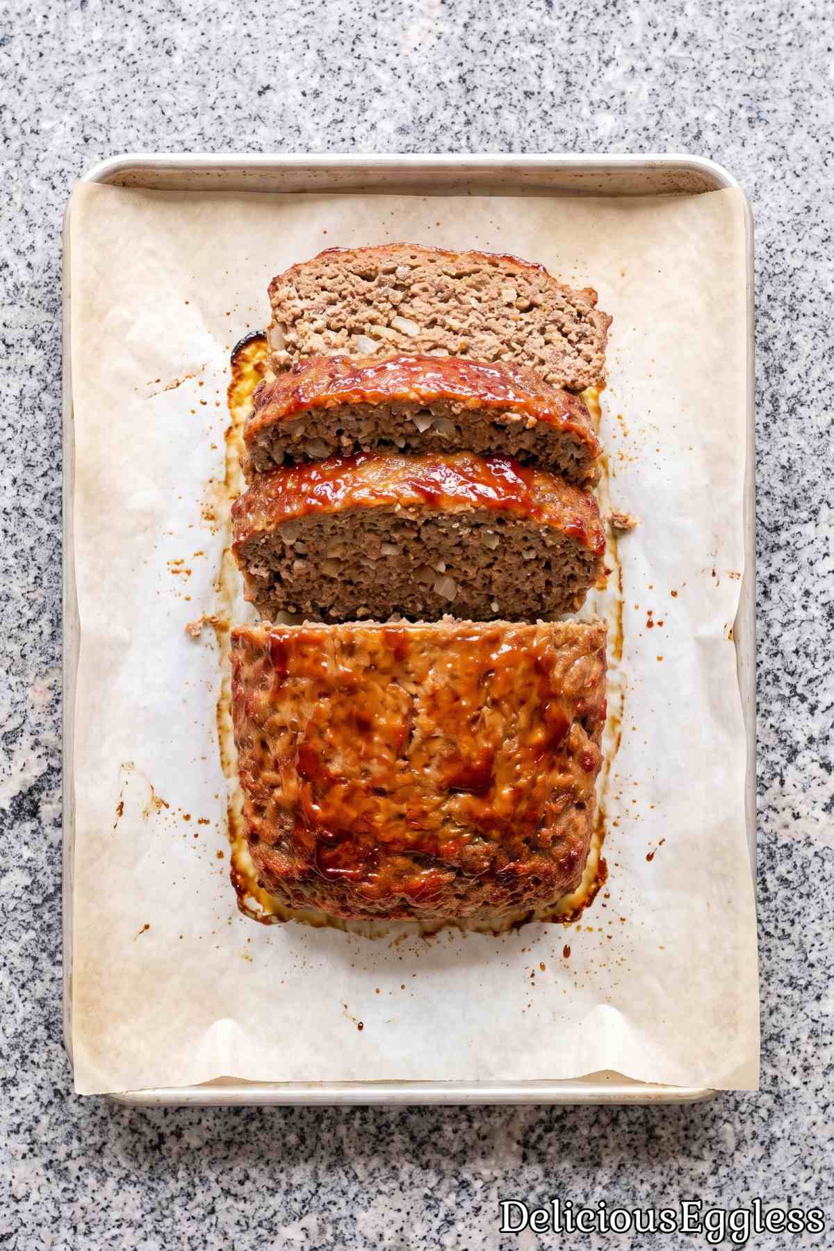 Freshly sliced eggless glazed meatloaf