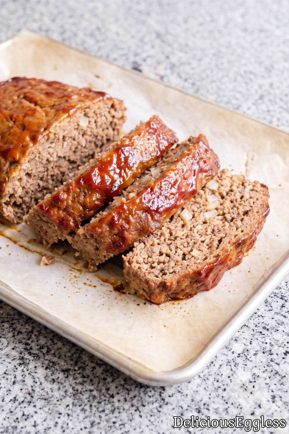 Juicy eggless glazed meatloaf on a plate