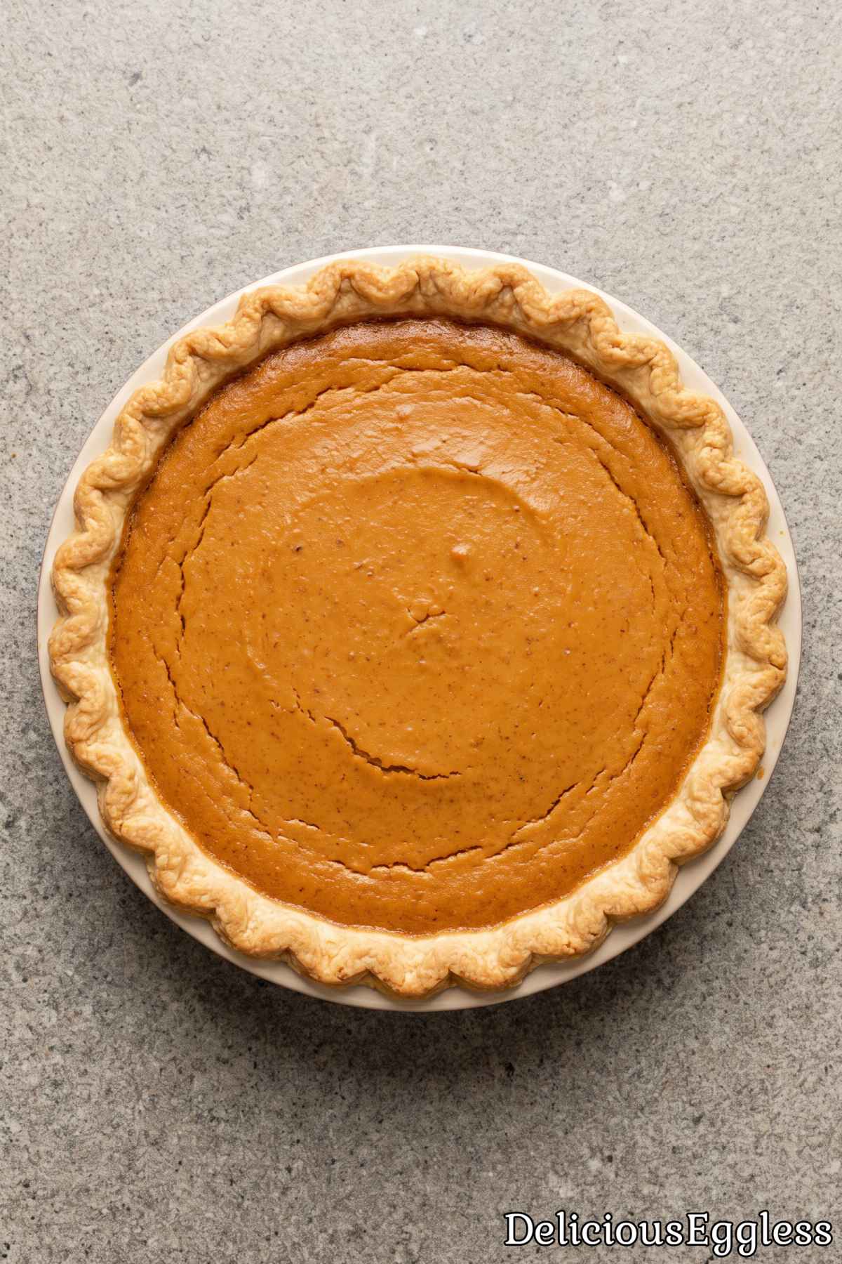 Slice of creamy eggless pumpkin pie