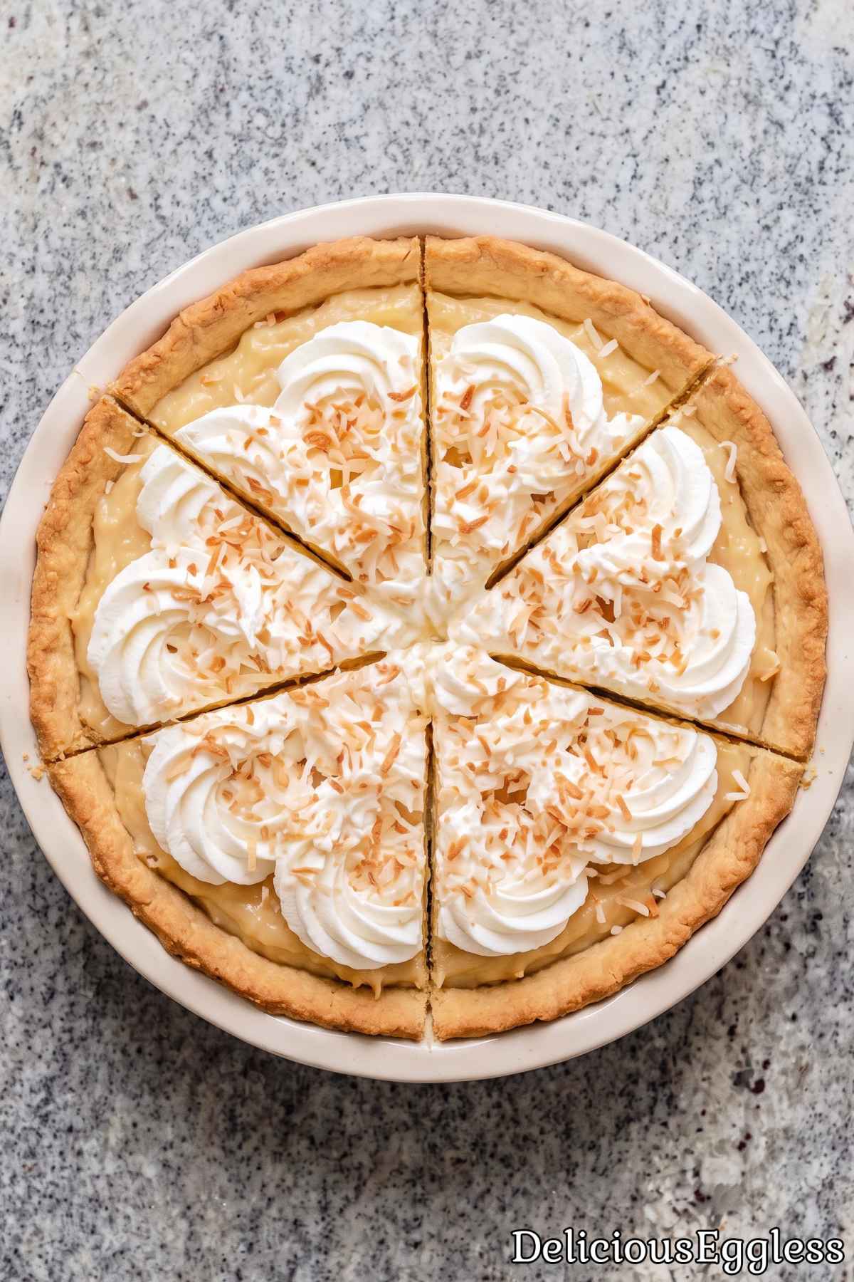 Slice of creamy eggless coconut cream pie.
