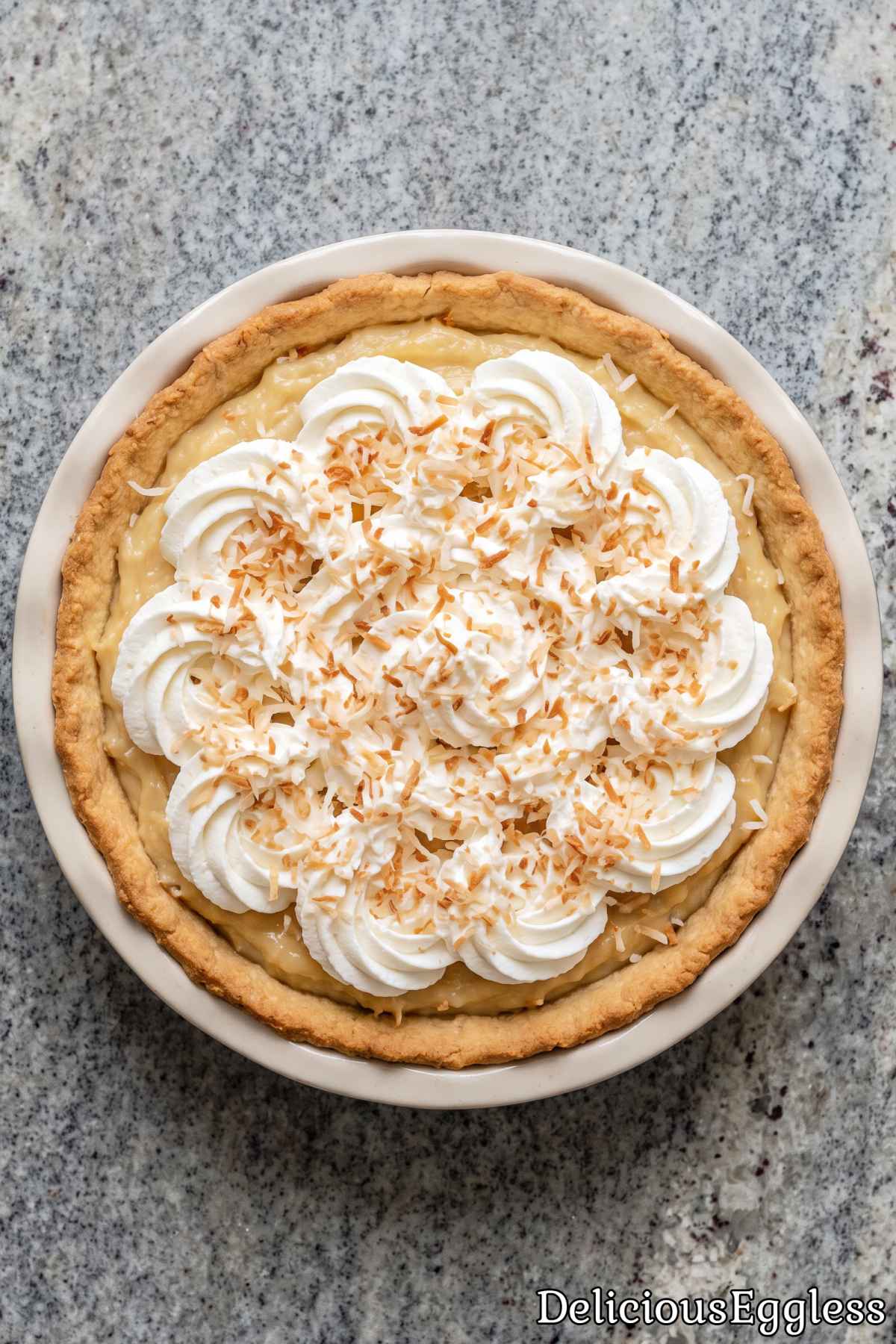 Freshly baked eggless coconut cream pie.