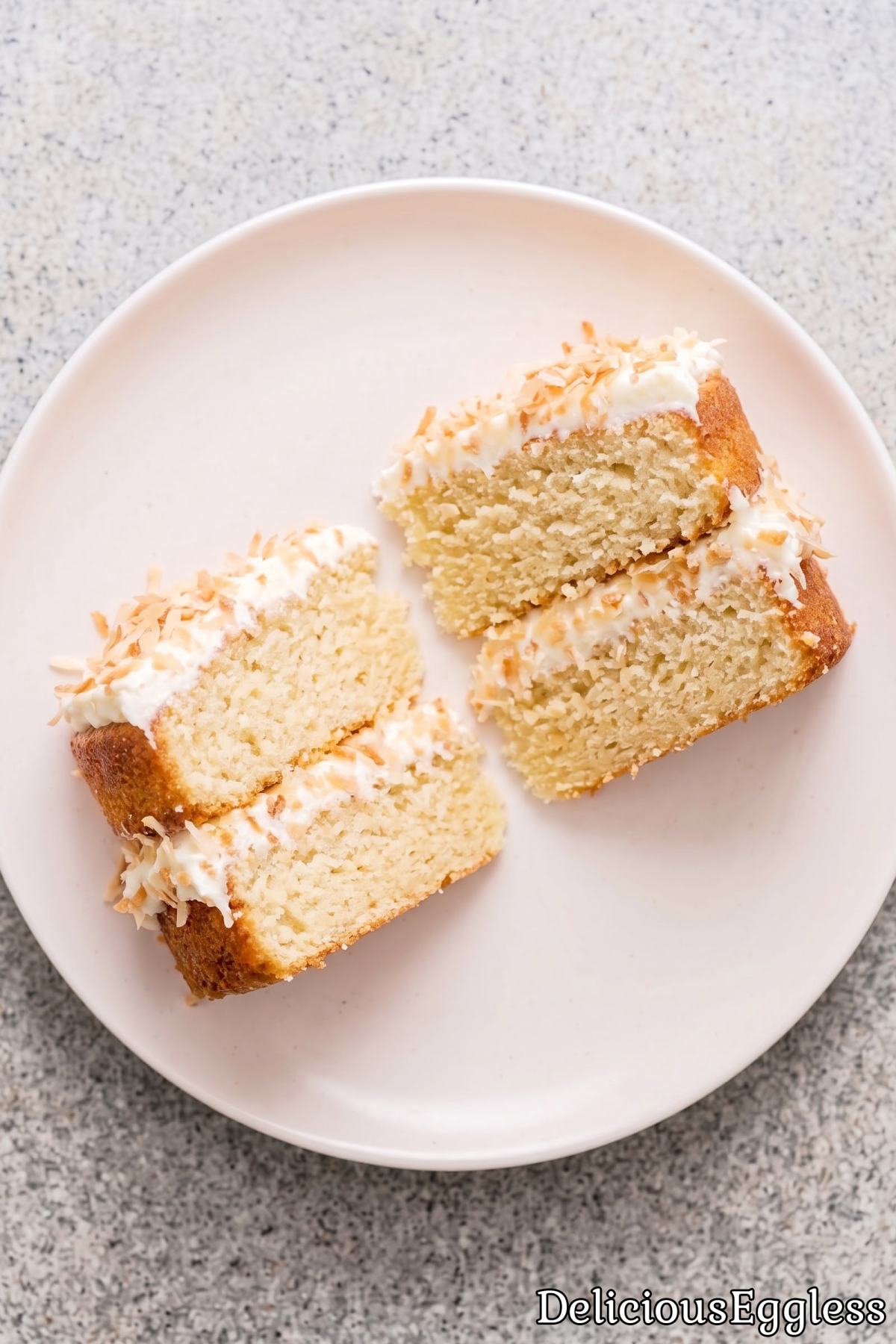 Frosted eggless coconut layer cake
