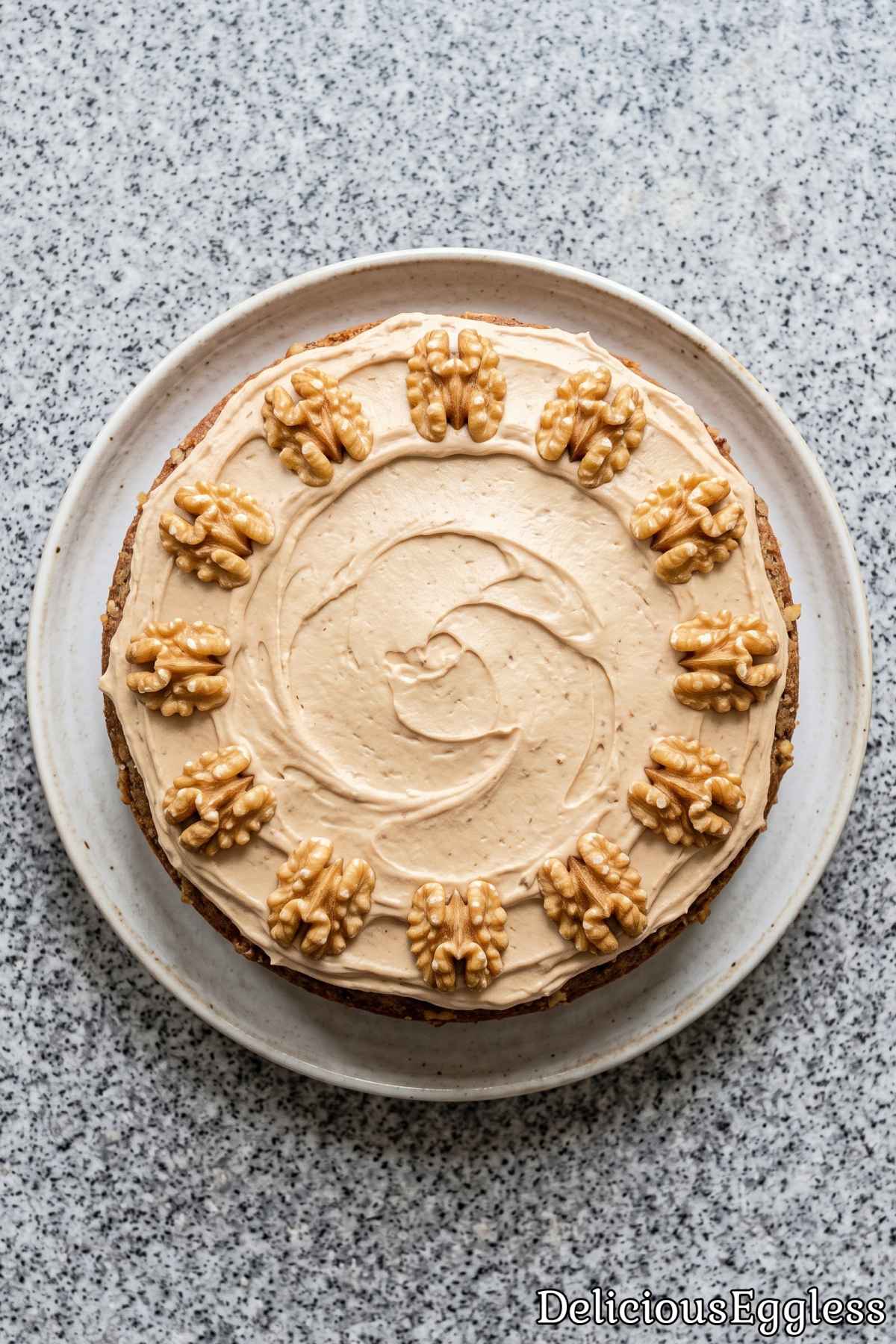 Tender eggless coffee walnut cake close up