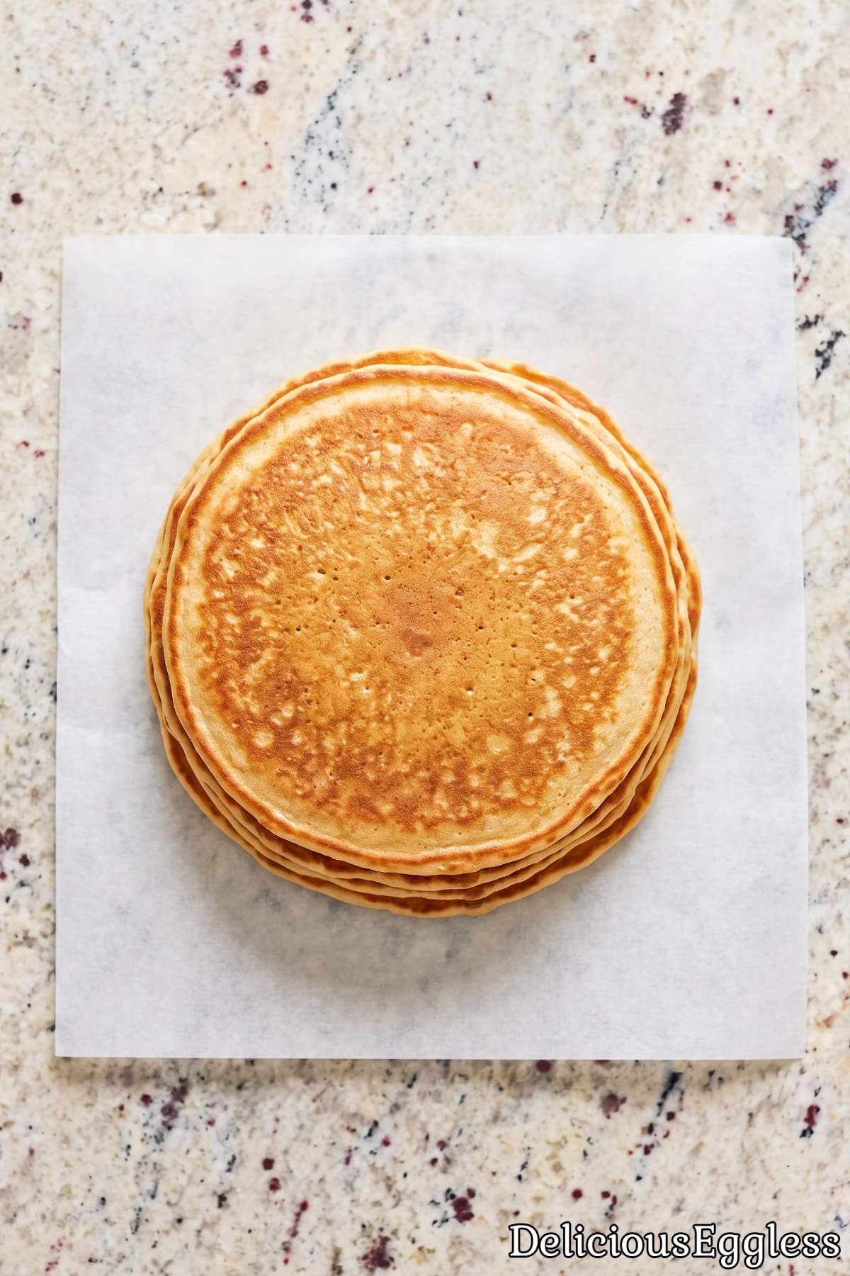 Stack of fluffy eggless cottage cheese pancakes