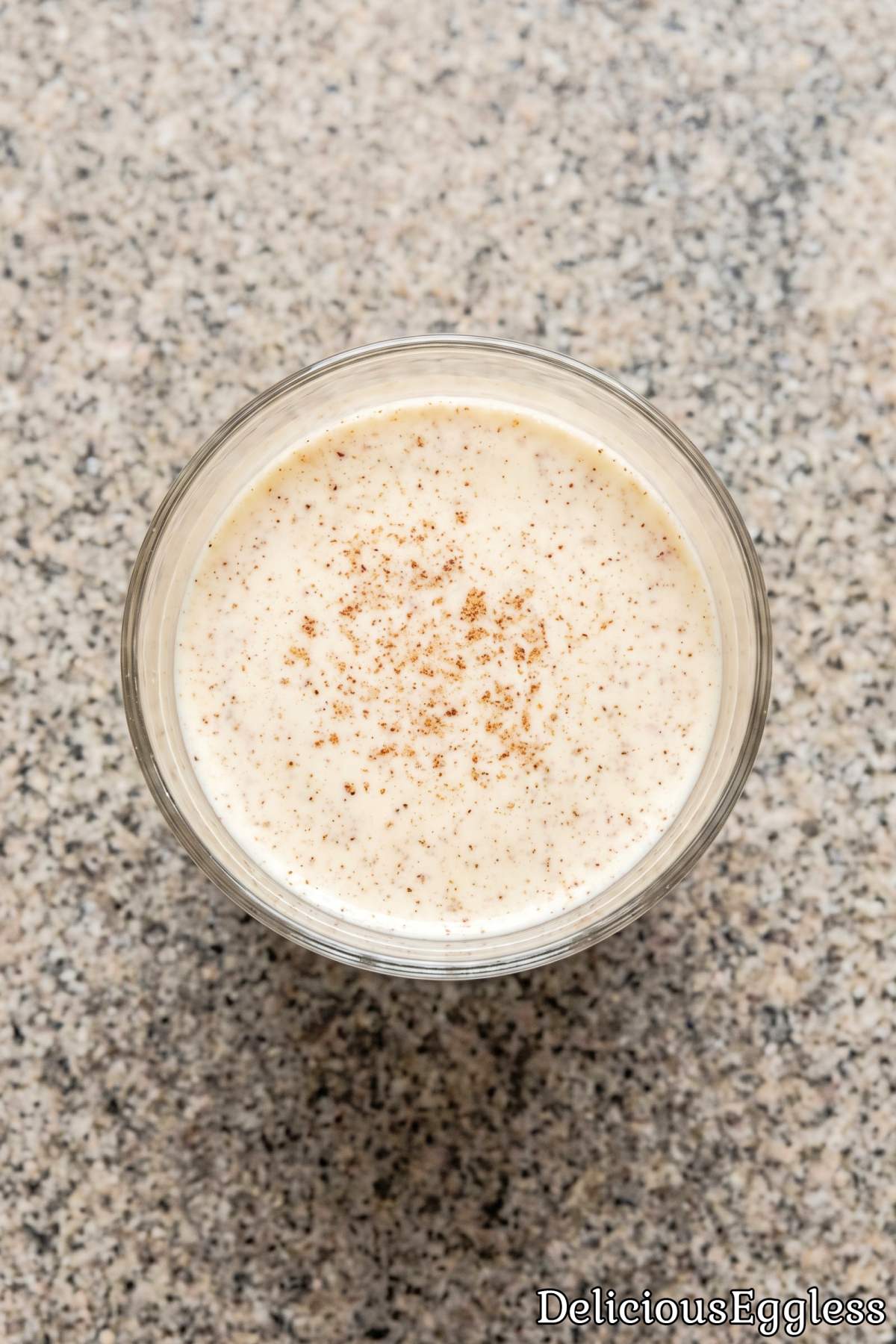 Glass of sweet eggless holiday drink