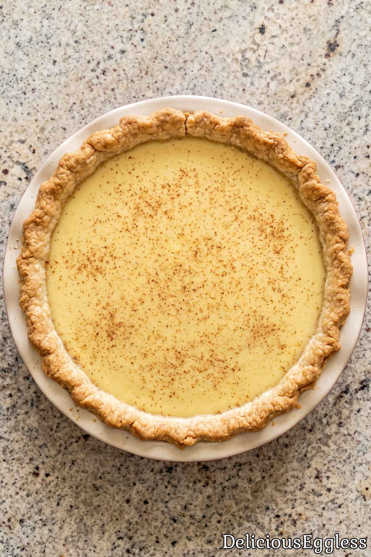 Classic eggless custard pie with nutmeg.