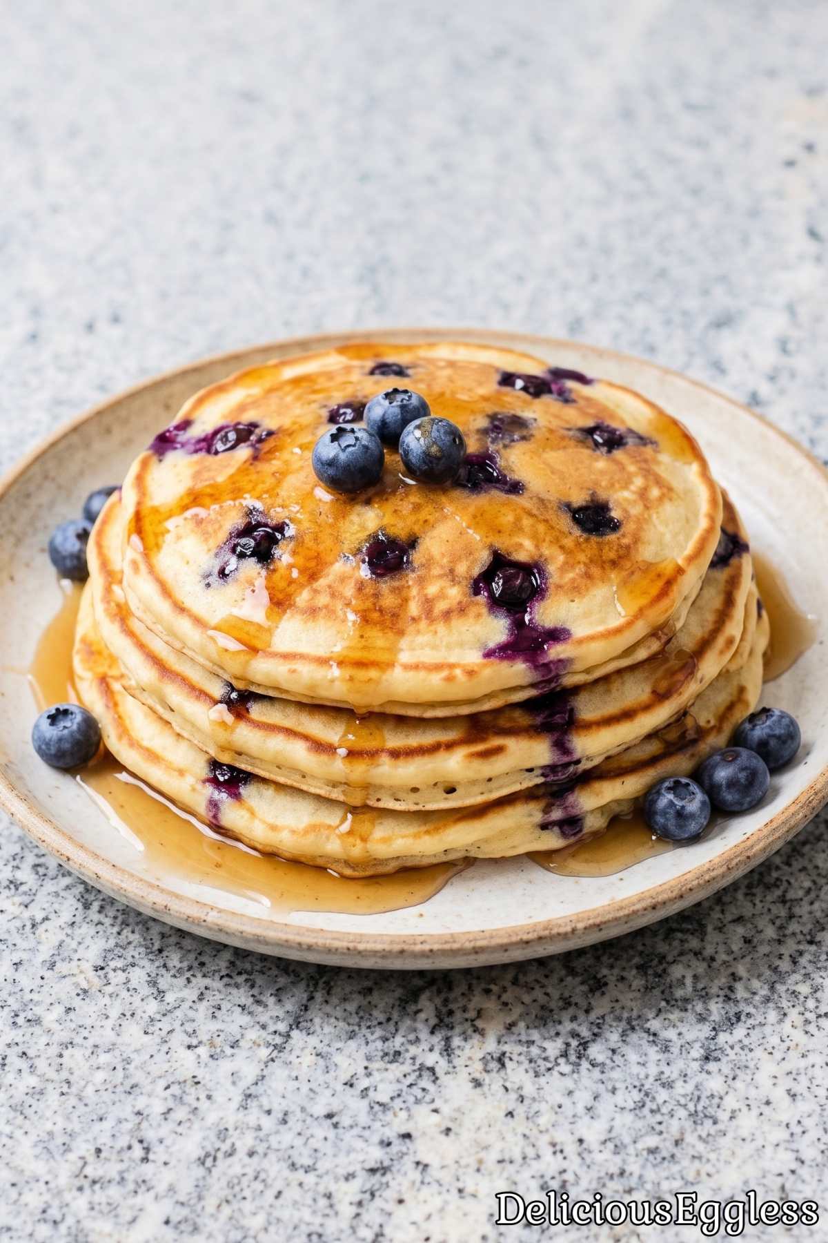 Thick eggless blueberry pancake stack