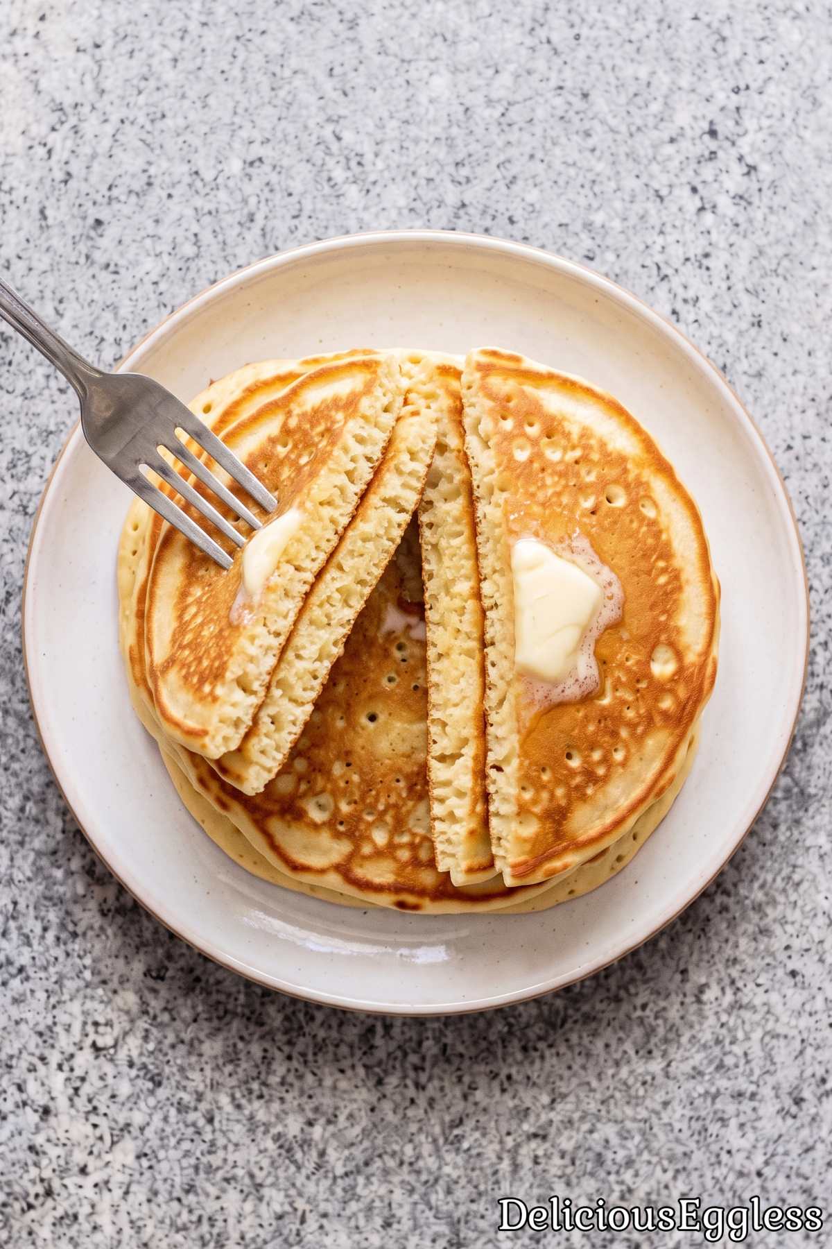 Soft eggless buttermilk pancakes with syrup