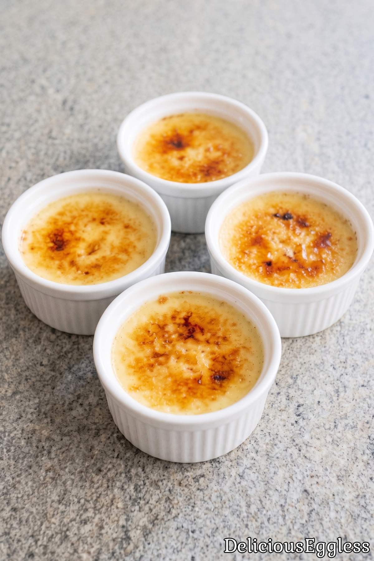 Smooth eggless vanilla creme brulee in ramekin