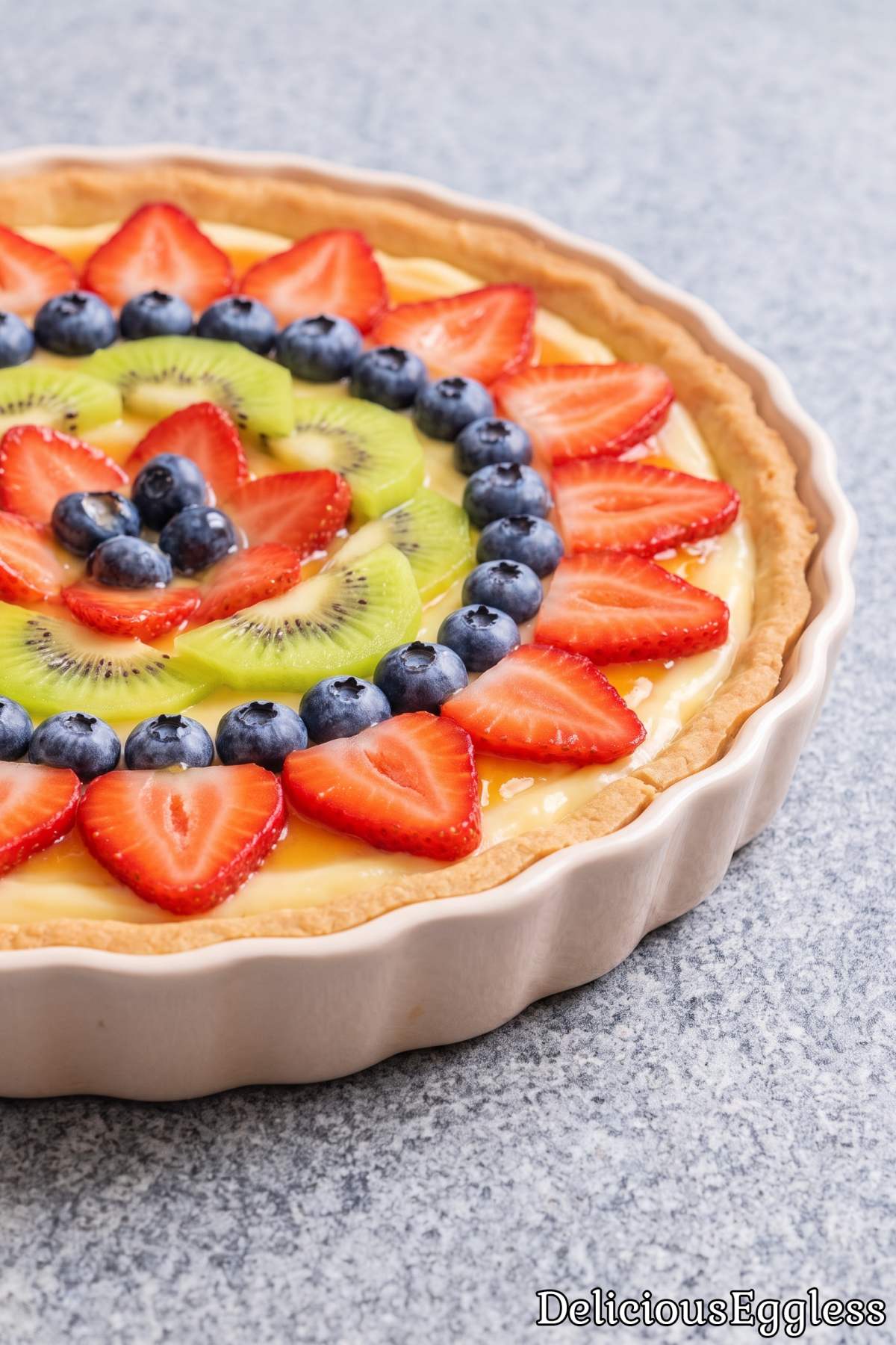 Light and fresh eggless fruit tart.