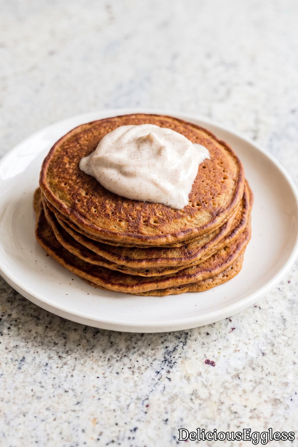 Plate of light eggless gingerbread pancakes