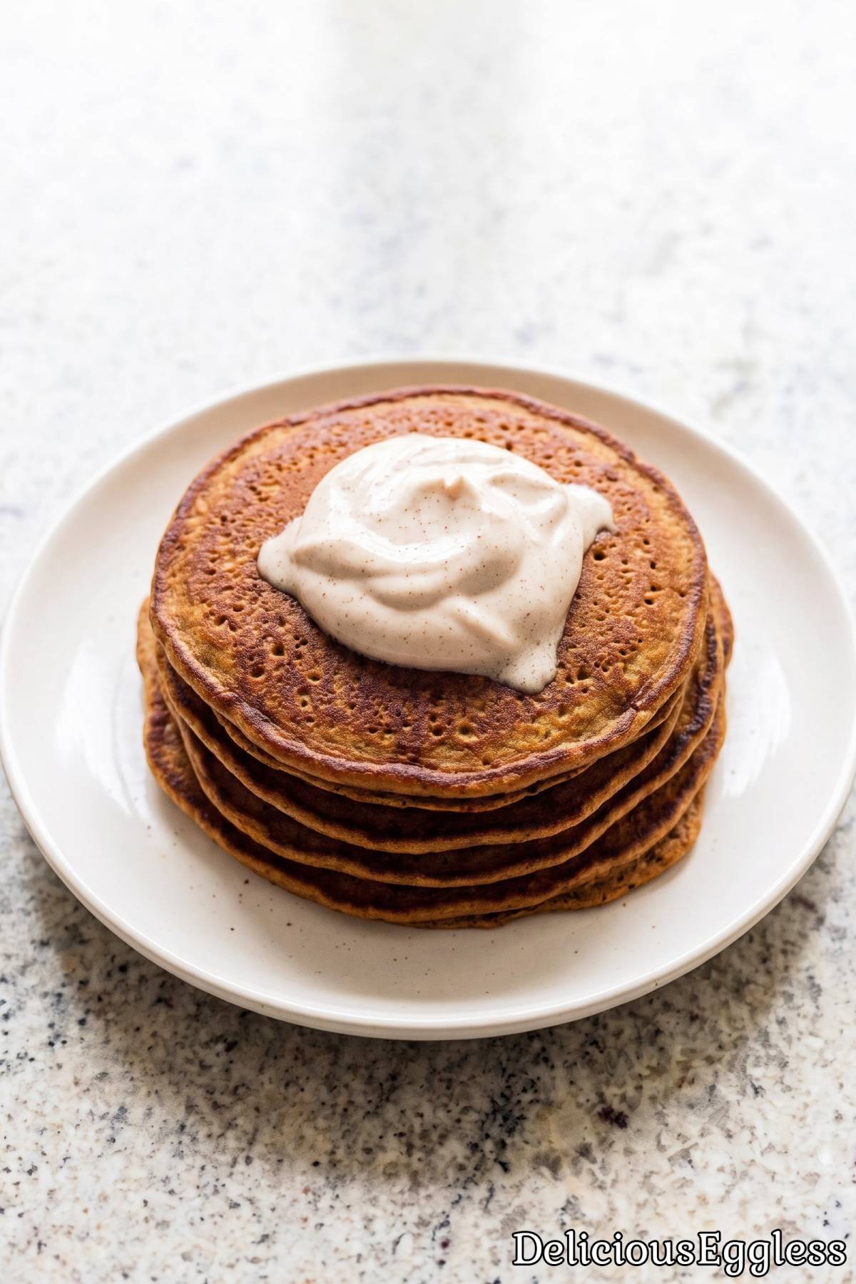 Stack of fluffy eggless gingerbread pancakes