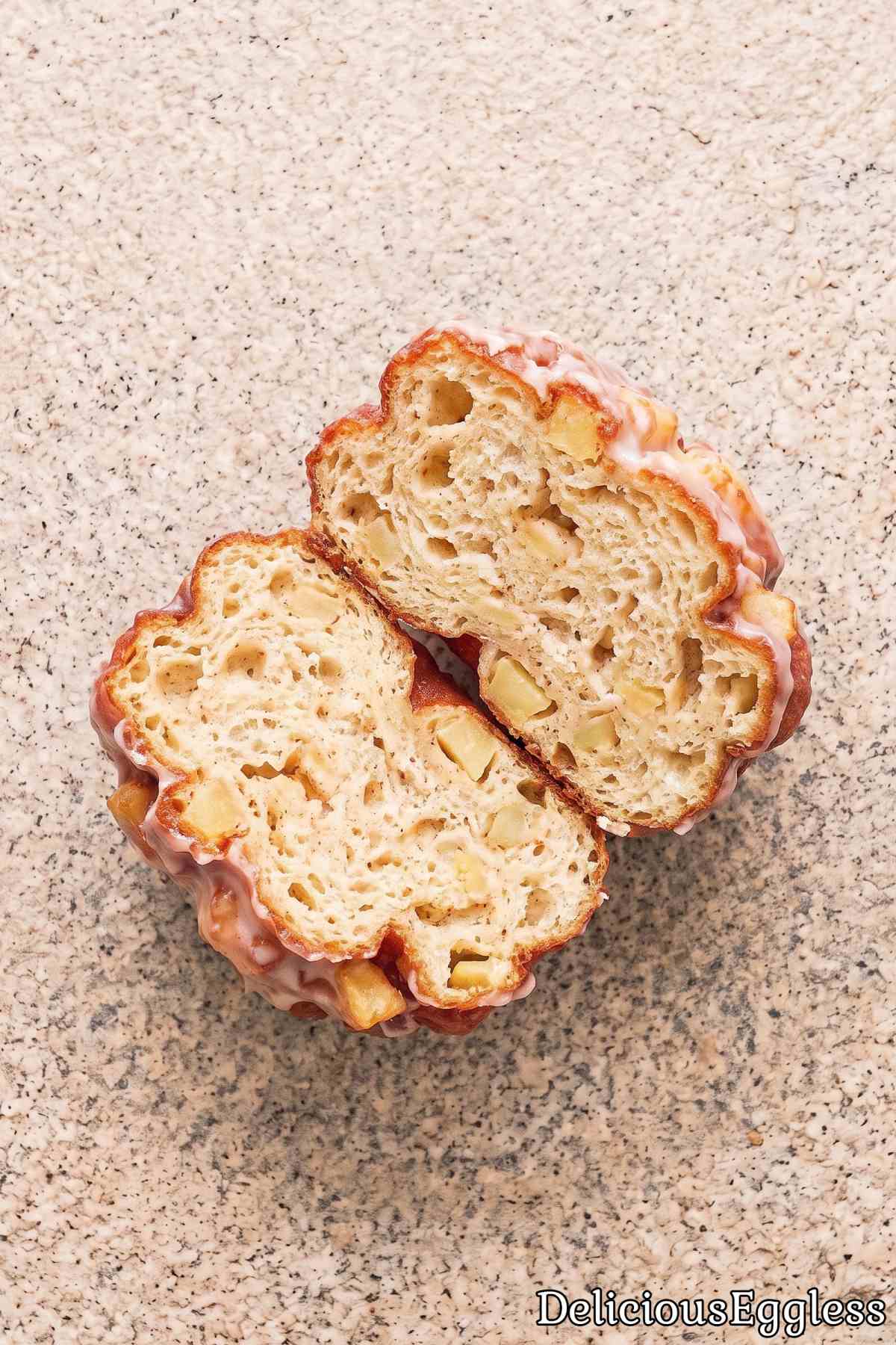 Warm eggless apple fritters topped with glaze