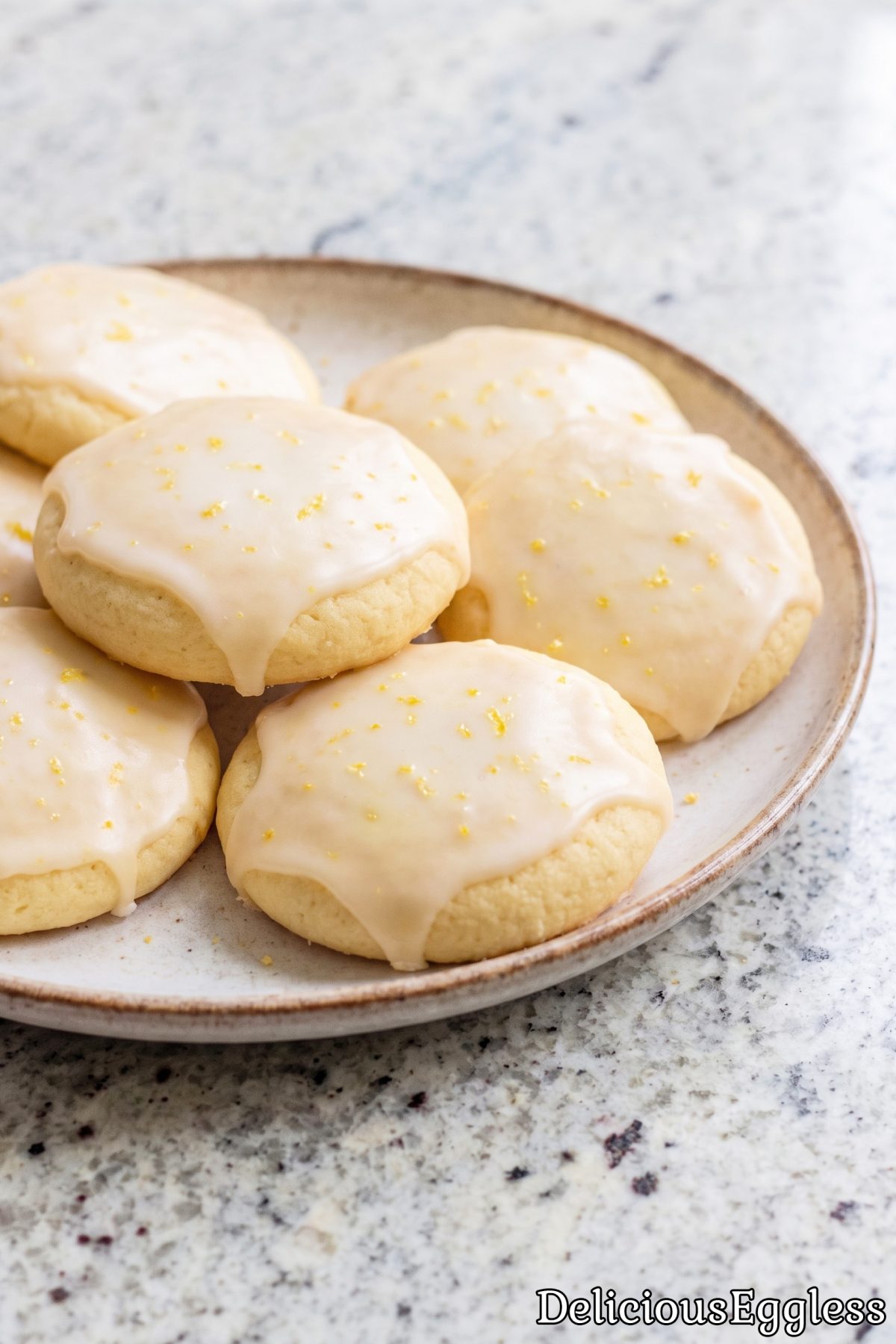 Tender eggless glazed lemon cookies