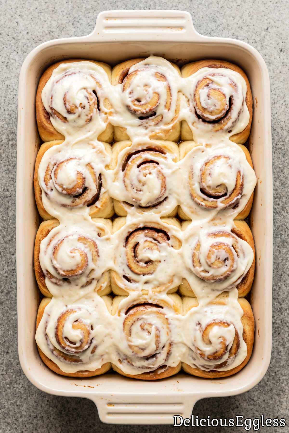 Fresh eggless gooey cinnamon rolls with icing