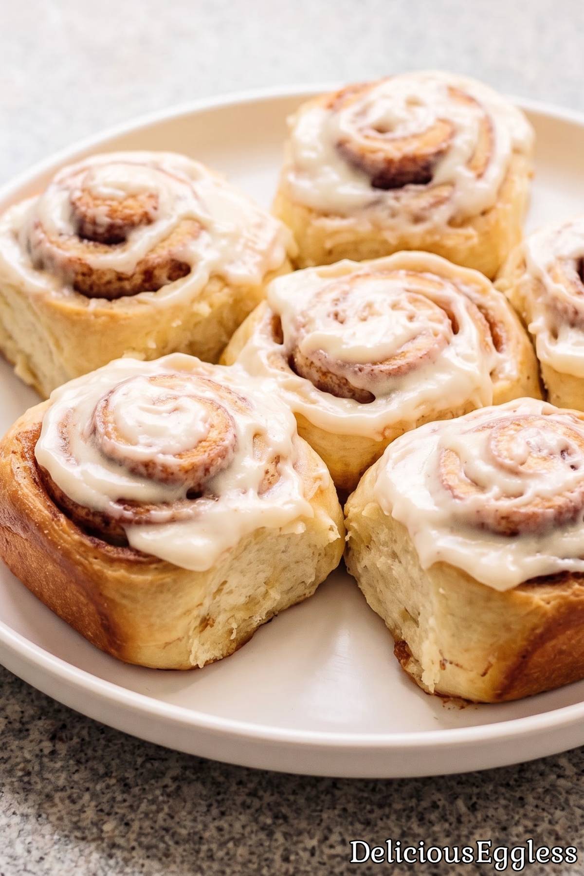 Sweet eggless cinnamon rolls with glaze