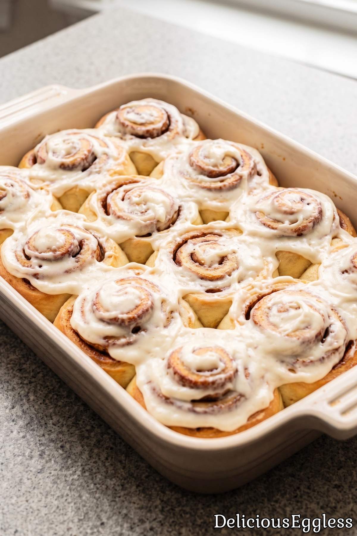 Warm homemade eggless gooey cinnamon rolls