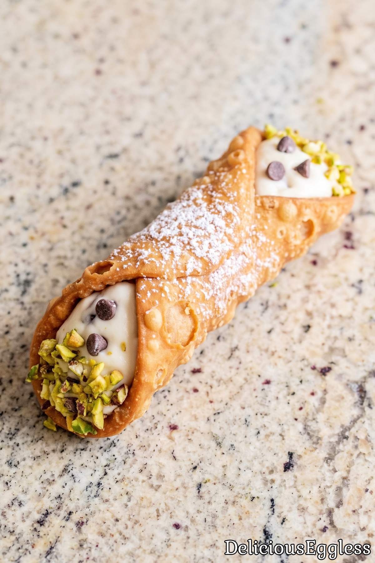 Eggless Italian cannoli dusted with sugar