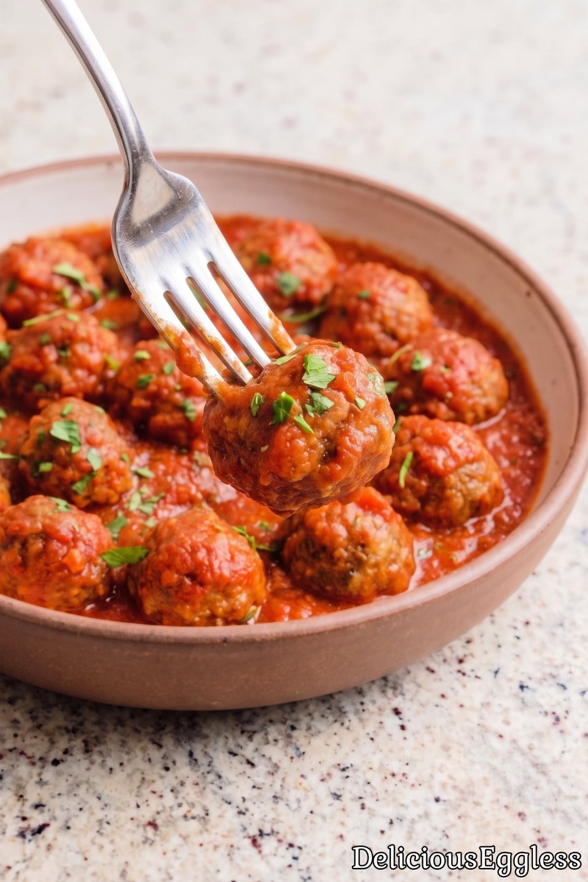 Rich tomato sauce over eggless meatballs