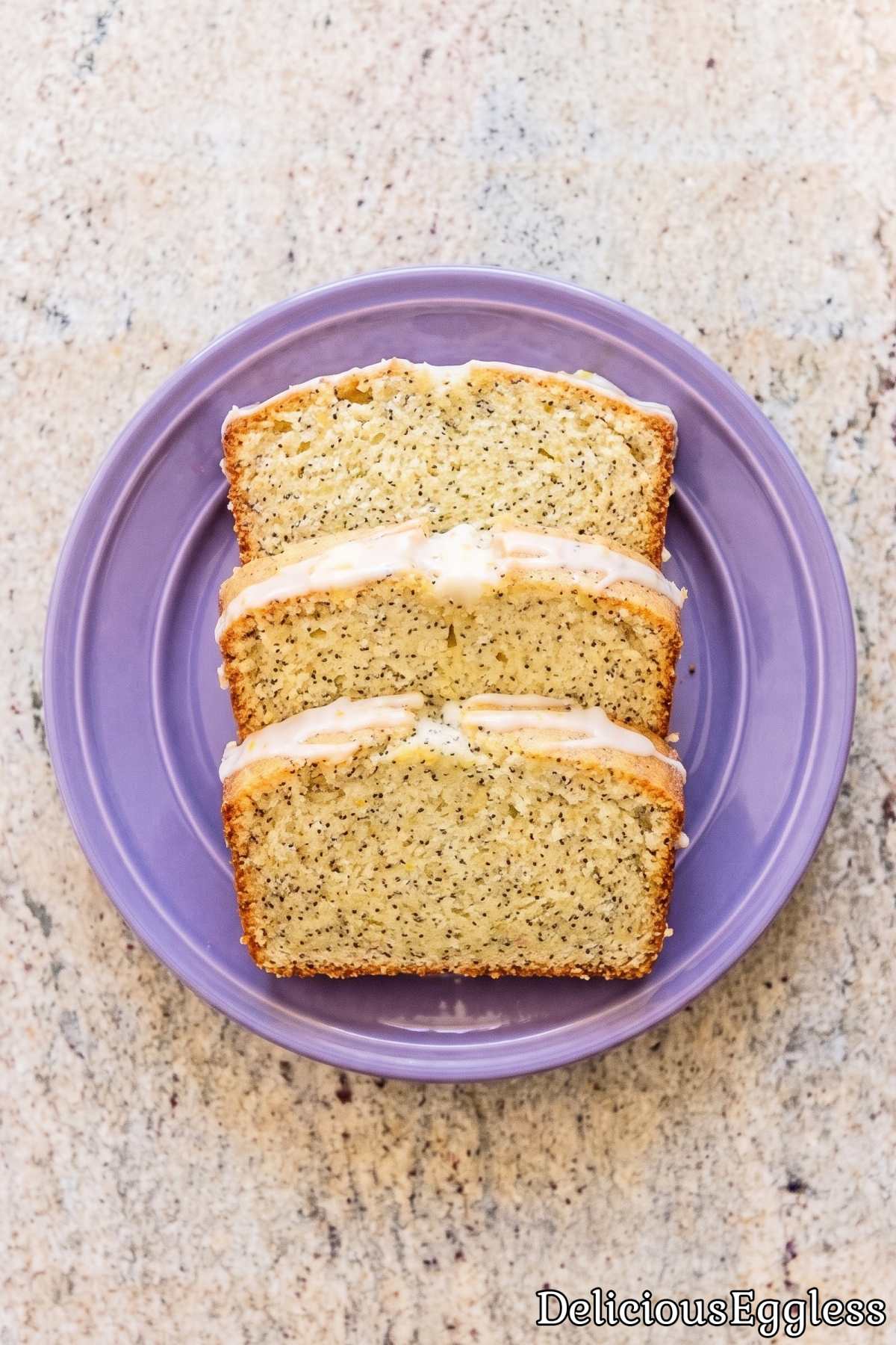 Glazed eggless lemon poppy seed loaf
