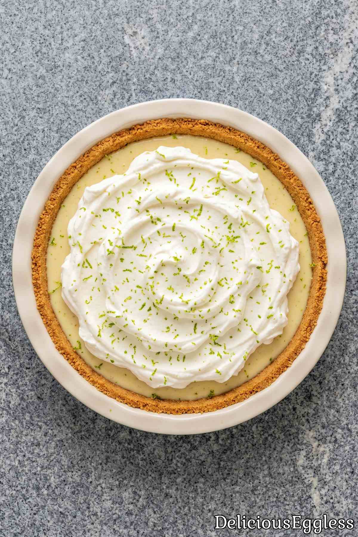 Slice of creamy eggless no bake key lime pie.