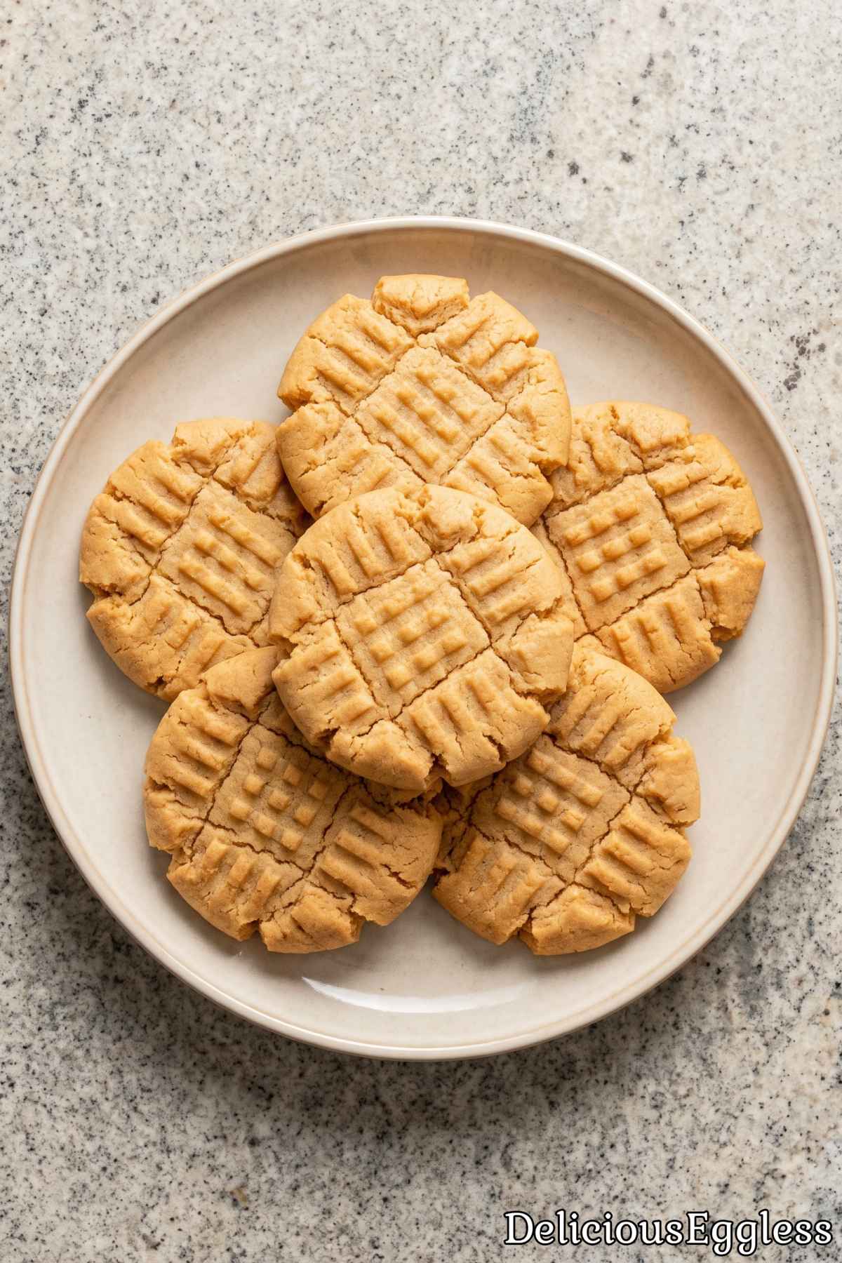 Tasty eggless peanut butter cookies on a tray