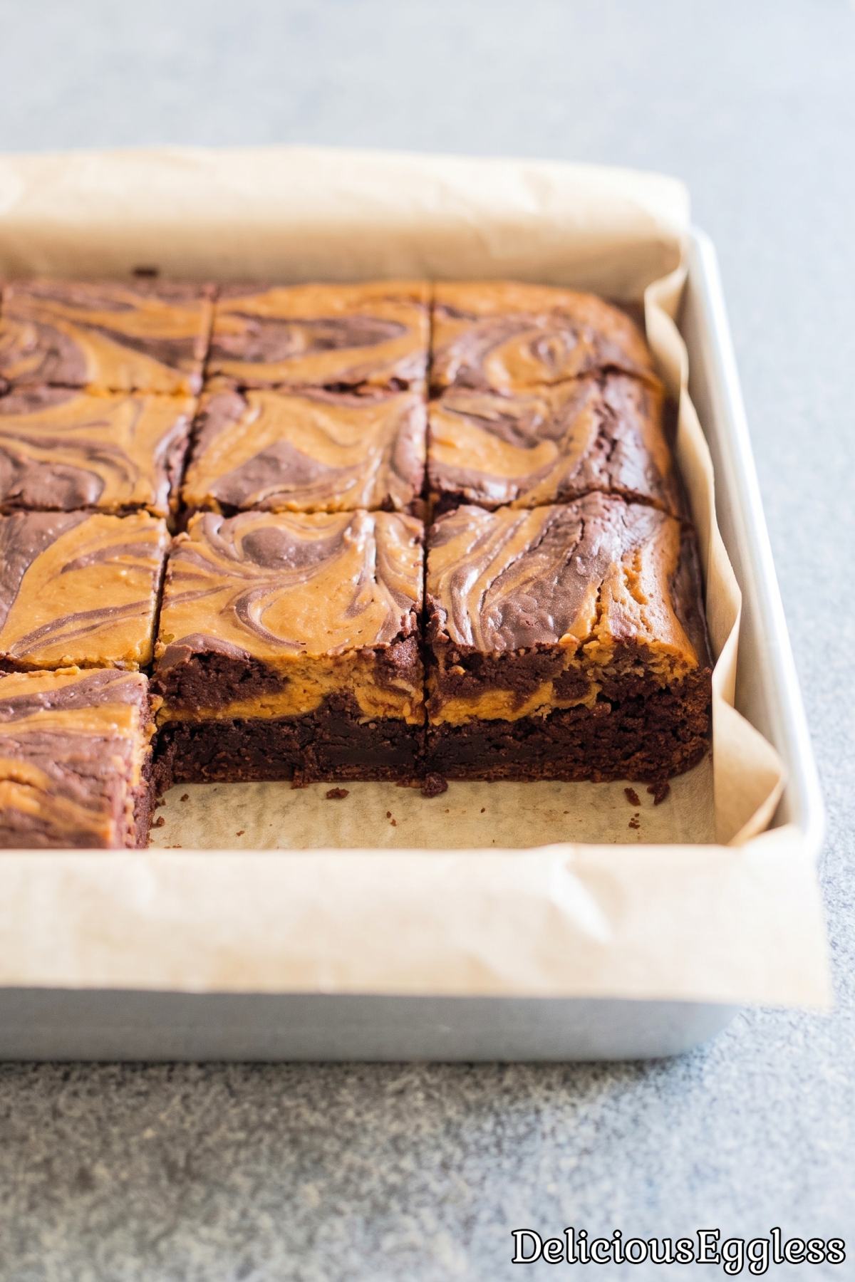 Creamy eggless pumpkin cheesecake brownies
