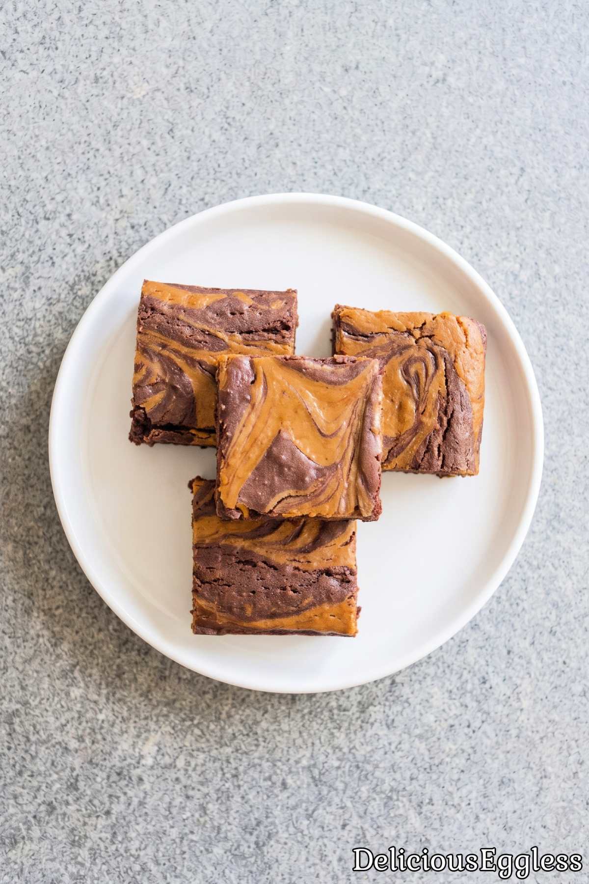 Baked pumpkin cheesecake swirl brownies