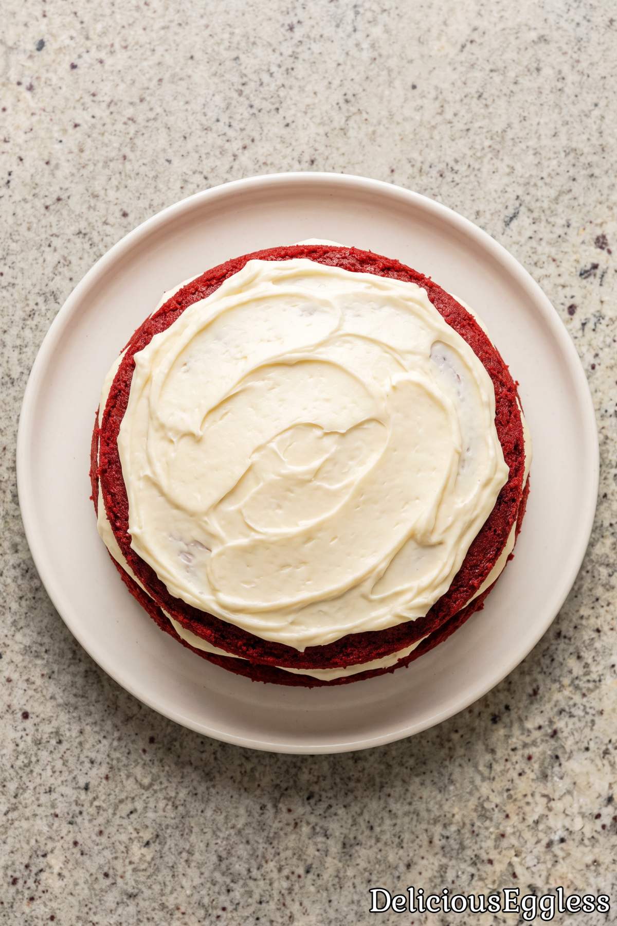 Soft eggless red velvet cake with cream