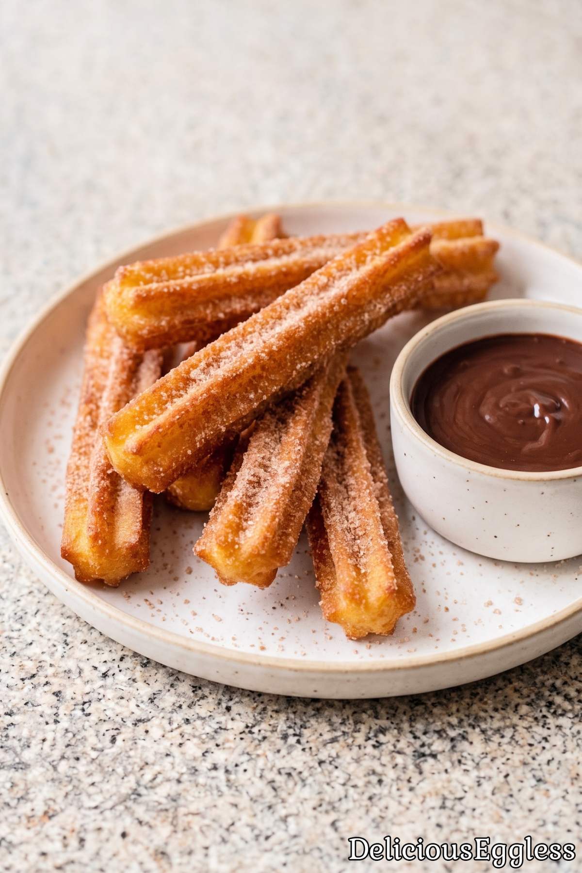Sweet cinnamon coated eggless churros