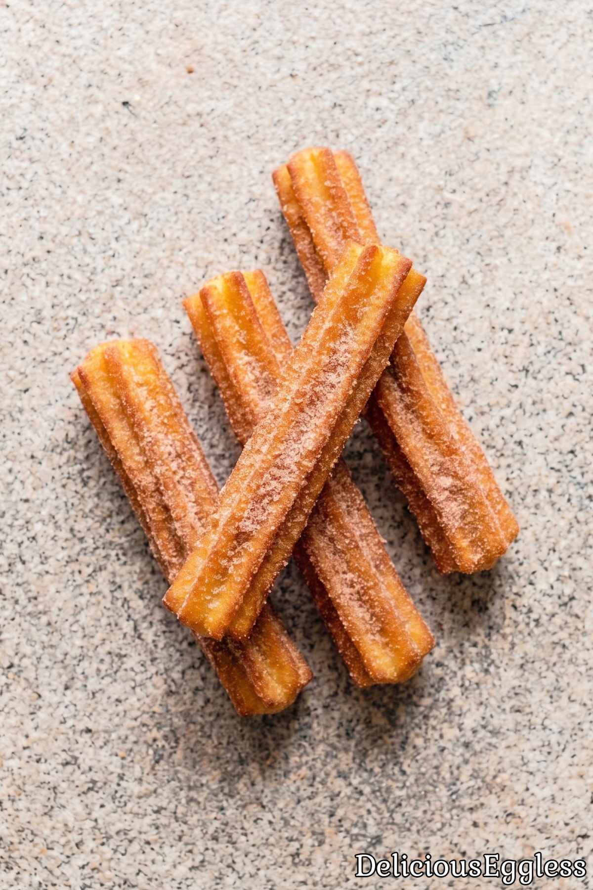 Warm eggless churros with cinnamon sugar