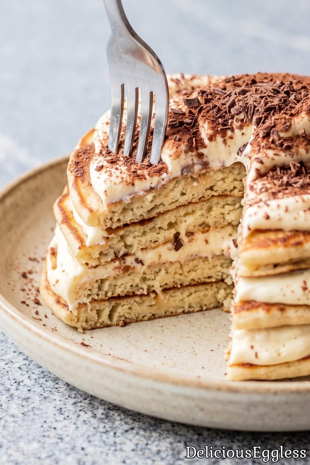 Cocoa dusted eggless tiramisu pancake stack