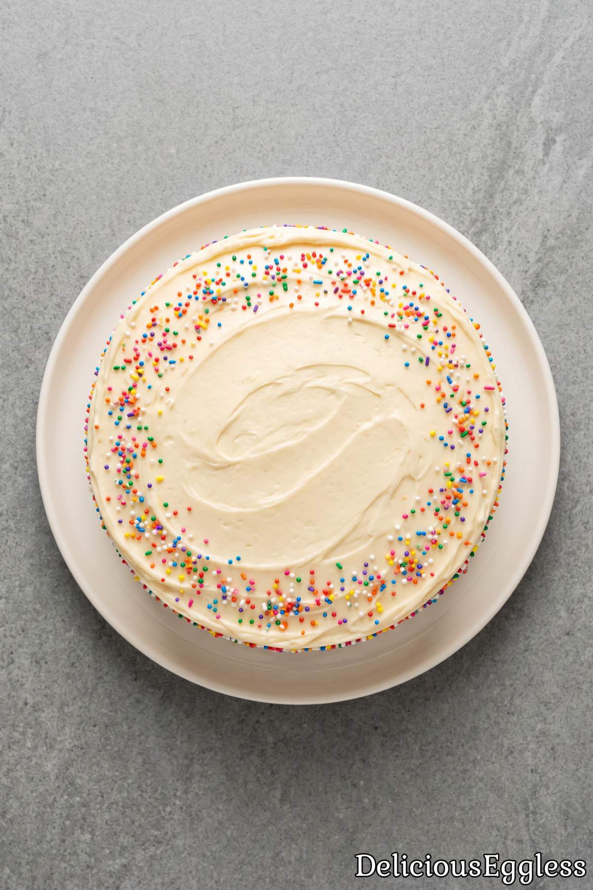 Delicious layered eggless vanilla birthday cake