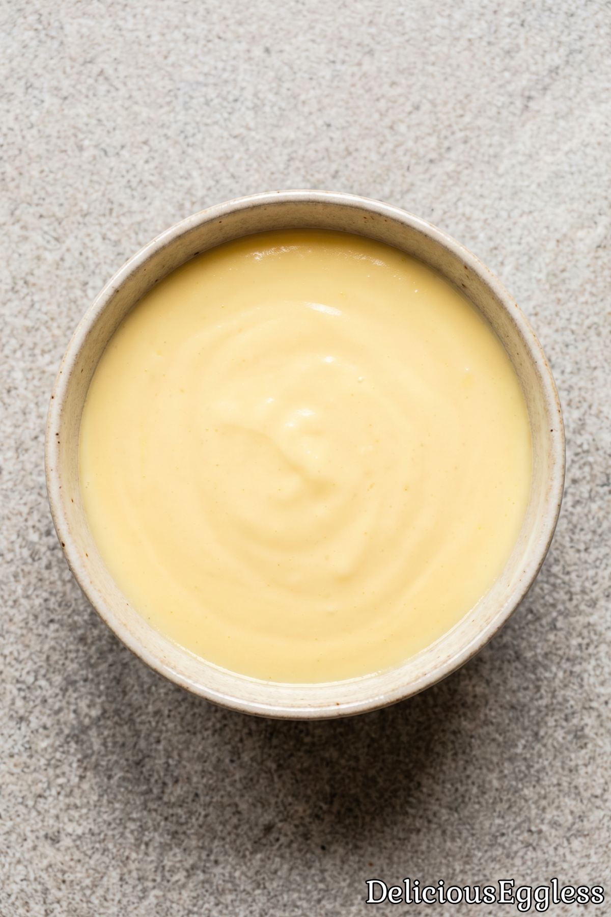 A chilled bowl of eggless vanilla custard